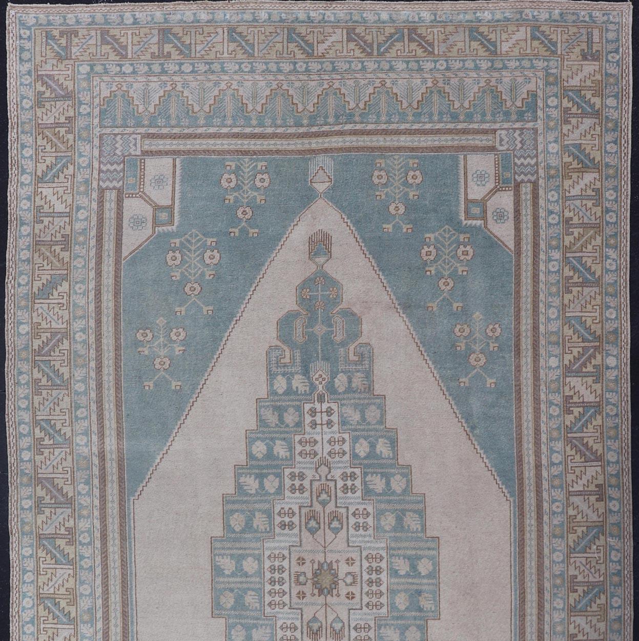 Wool Large Vintage Turkish Oushak Rug with Central Medallion in Blue and Cream For Sale