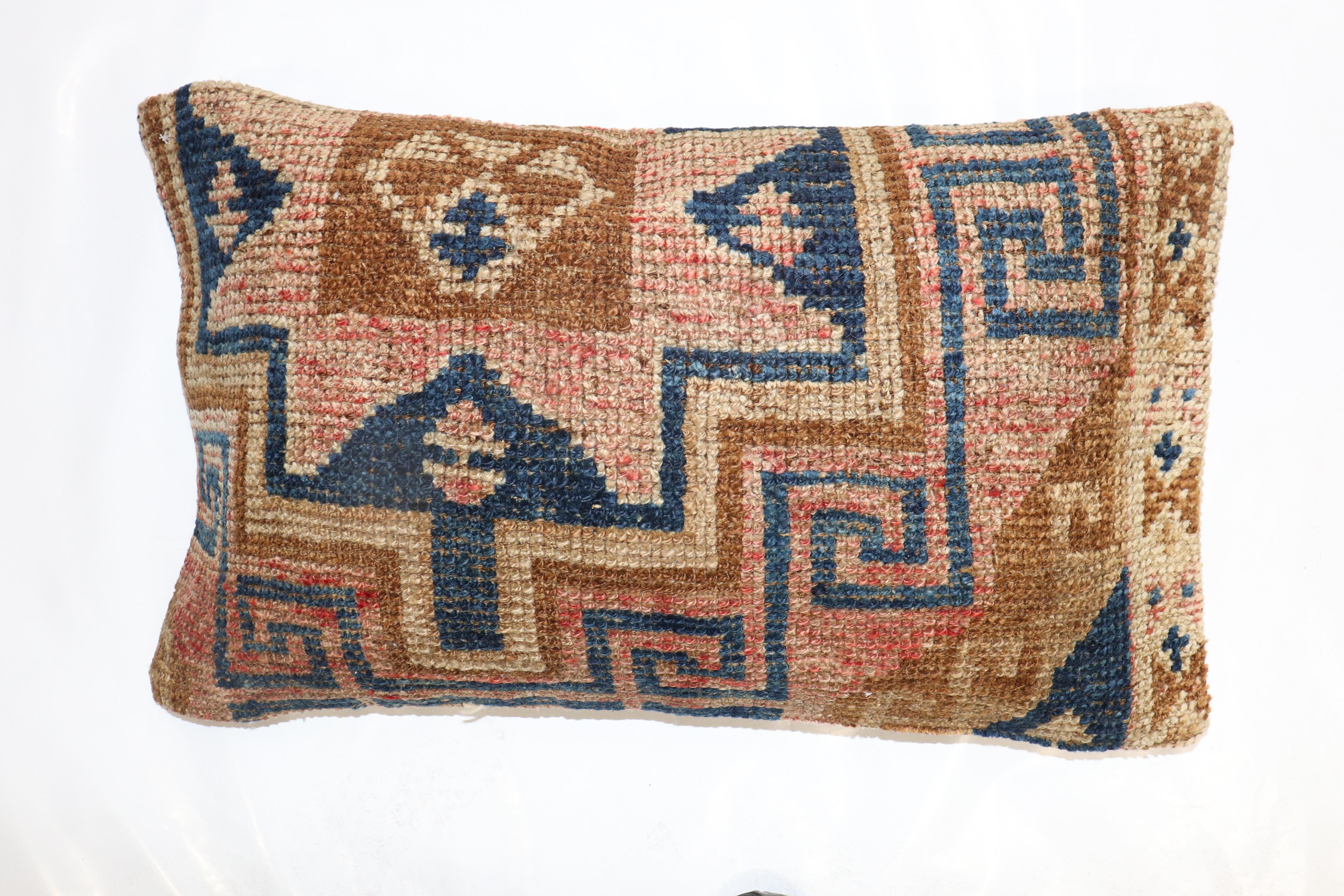 Large Pillow made from a vintage Turkish Anatolian Rug

Measures: 17'' x 31''.