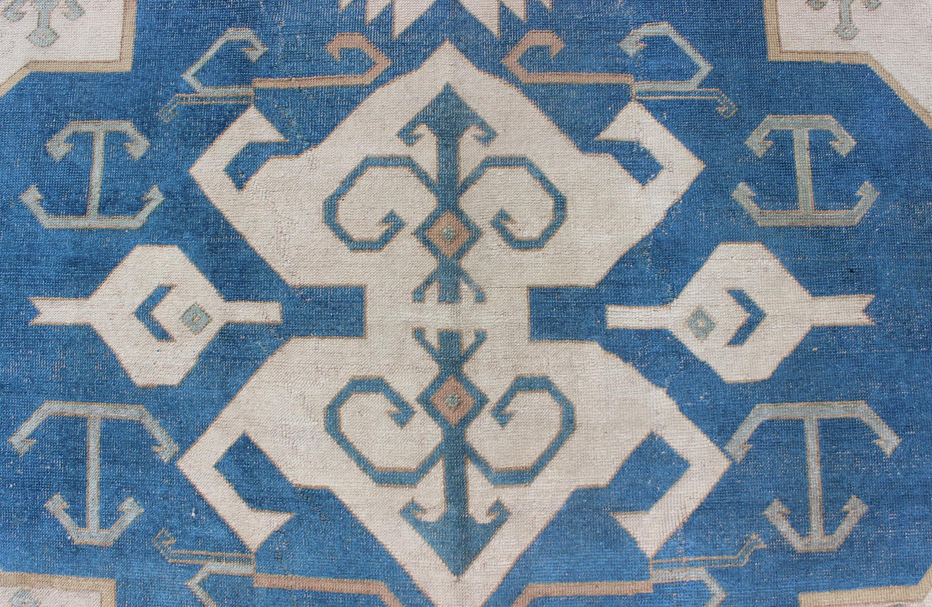 20th Century Large Vintage Turkish Rug with Stylized Geometric Design in Blue, Ivory, Tan For Sale