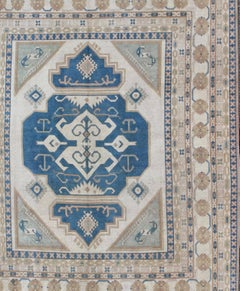 Large Vintage Turkish Rug with Stylized Geometric Design in Blue, Ivory, Tan