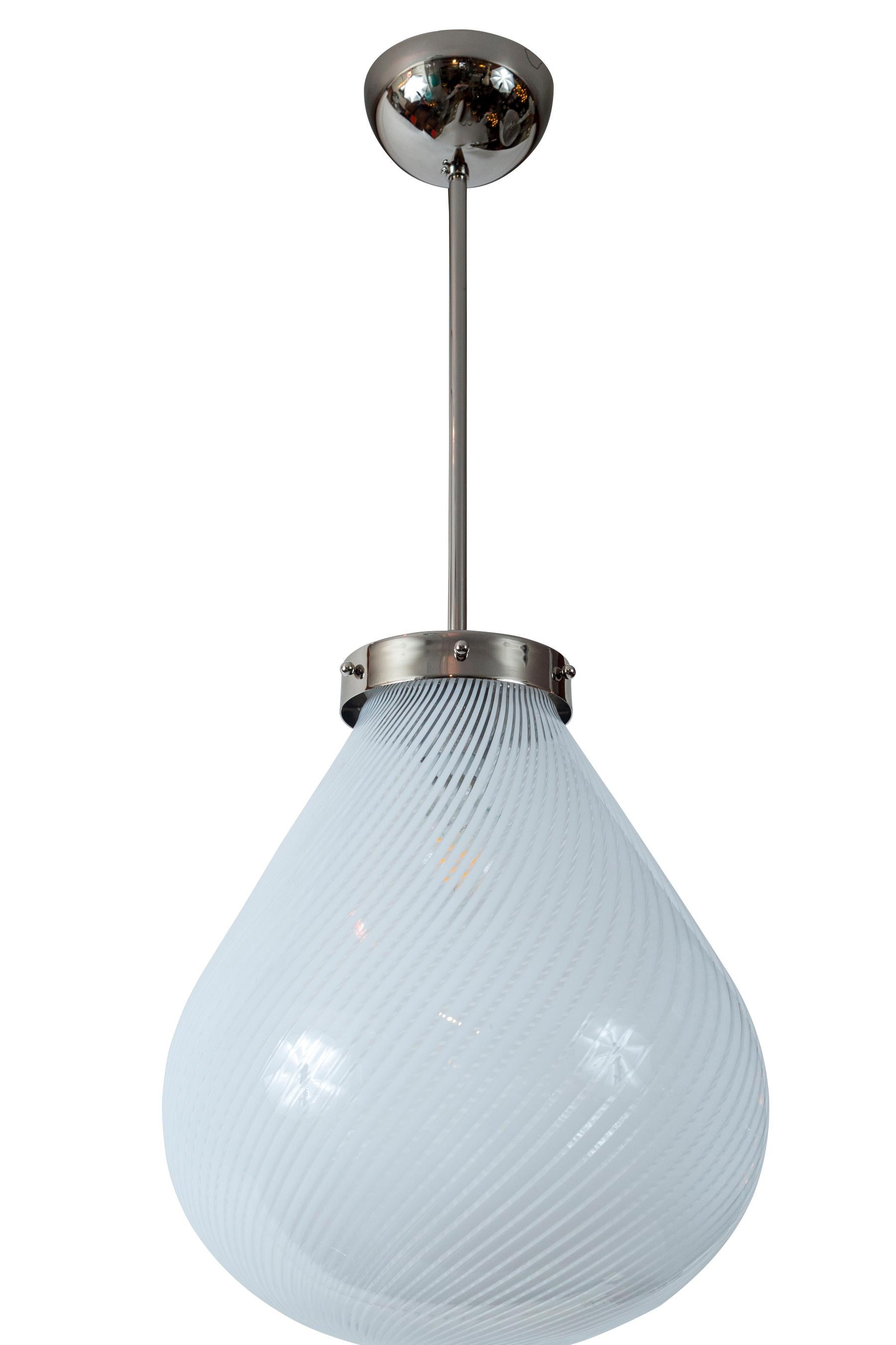 Mid-century glass blown swirl pendant in a unique form, hardware recent in nickel on brass.
UL certified & re-electrified with one single medium base socket for up to 40 watts for an incandescent bulb or higher for with LED

Dimensions: 14?