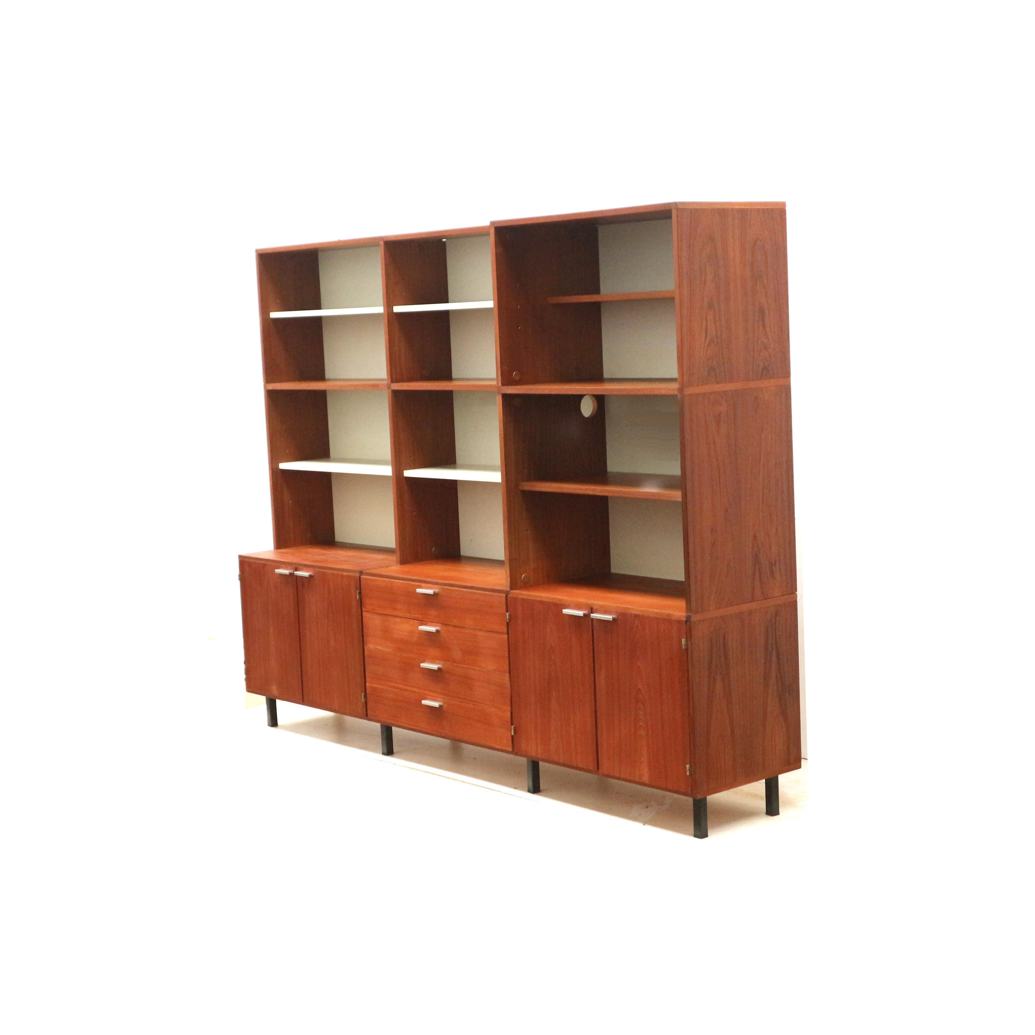 Large vintage wall unit / sideboard by Cees Braakman for Pastoe 'Made to Measure'.

Dimensions:
Width: 227.2 cm
Depth: 45 cm
Height: 178.7 cm

See the photos for the traces of use. The is a hole in one panel for wiring en general small traces of use.