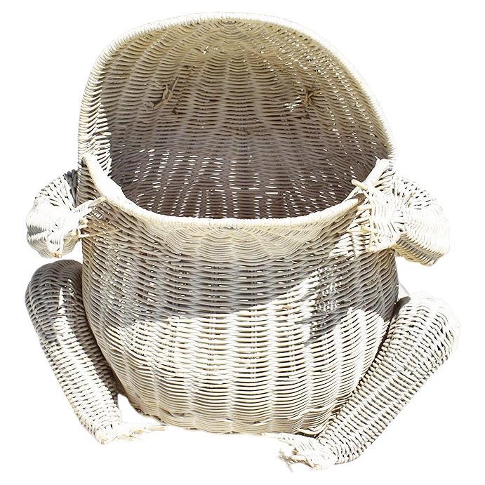 A whimsical white painted wicker frog basket. 

Dimensions:
17