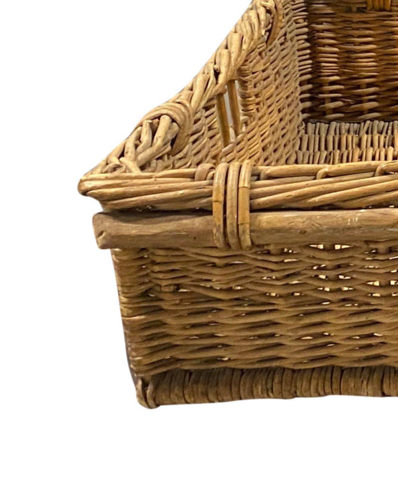 Wide shallow vintage wicker wash basket

Great for use in a laundry room or mudroom as a rustic dog bed

Damage to right handle

41″L x 20″W x 9″H