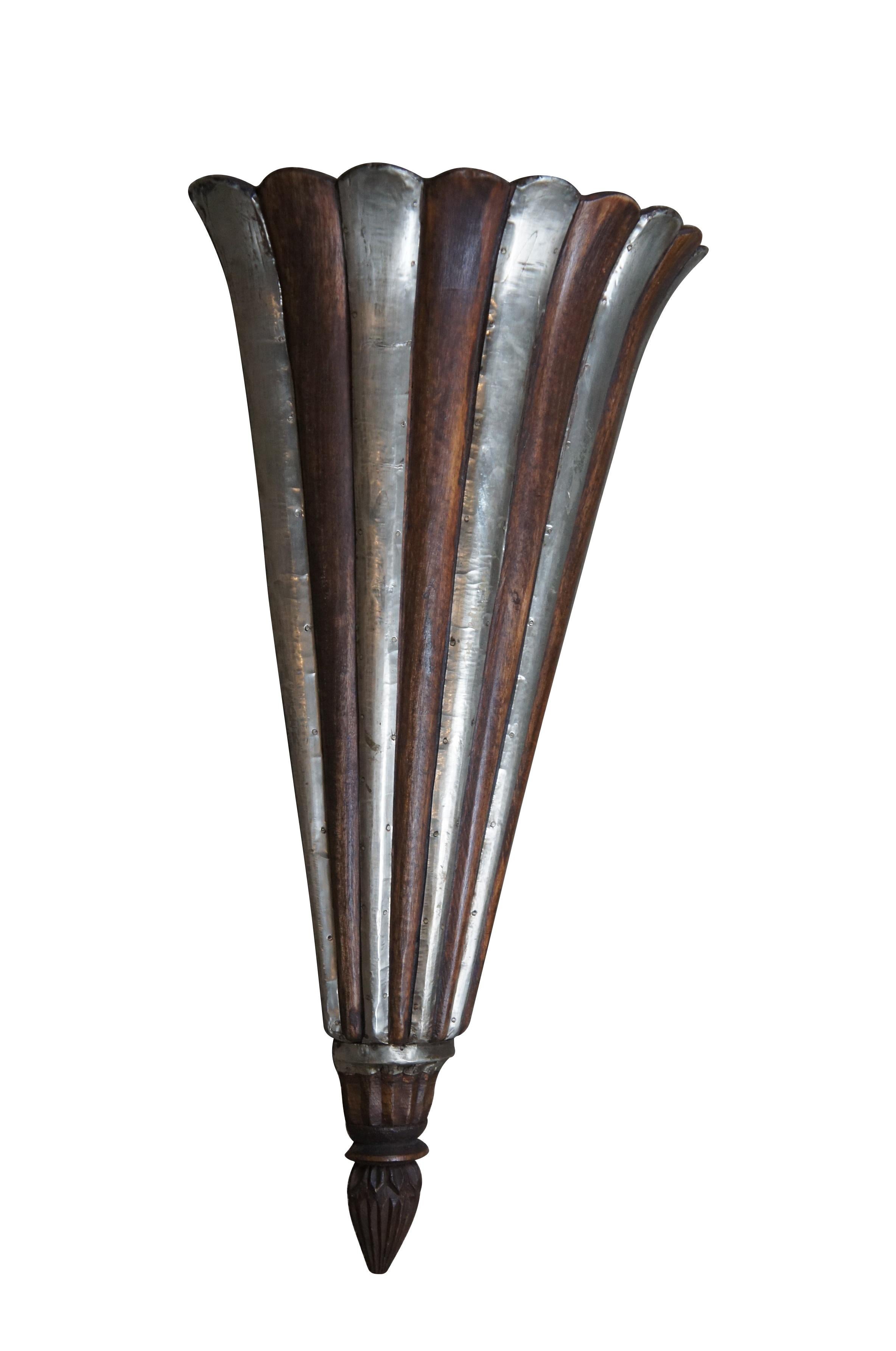 Mid to late 20th century wooden wall pocket / flower vase / sconce featuring a fluted torchiere design with scalloped edge, crafted of wood with alternating tin overlays.

Dimensions:
14
