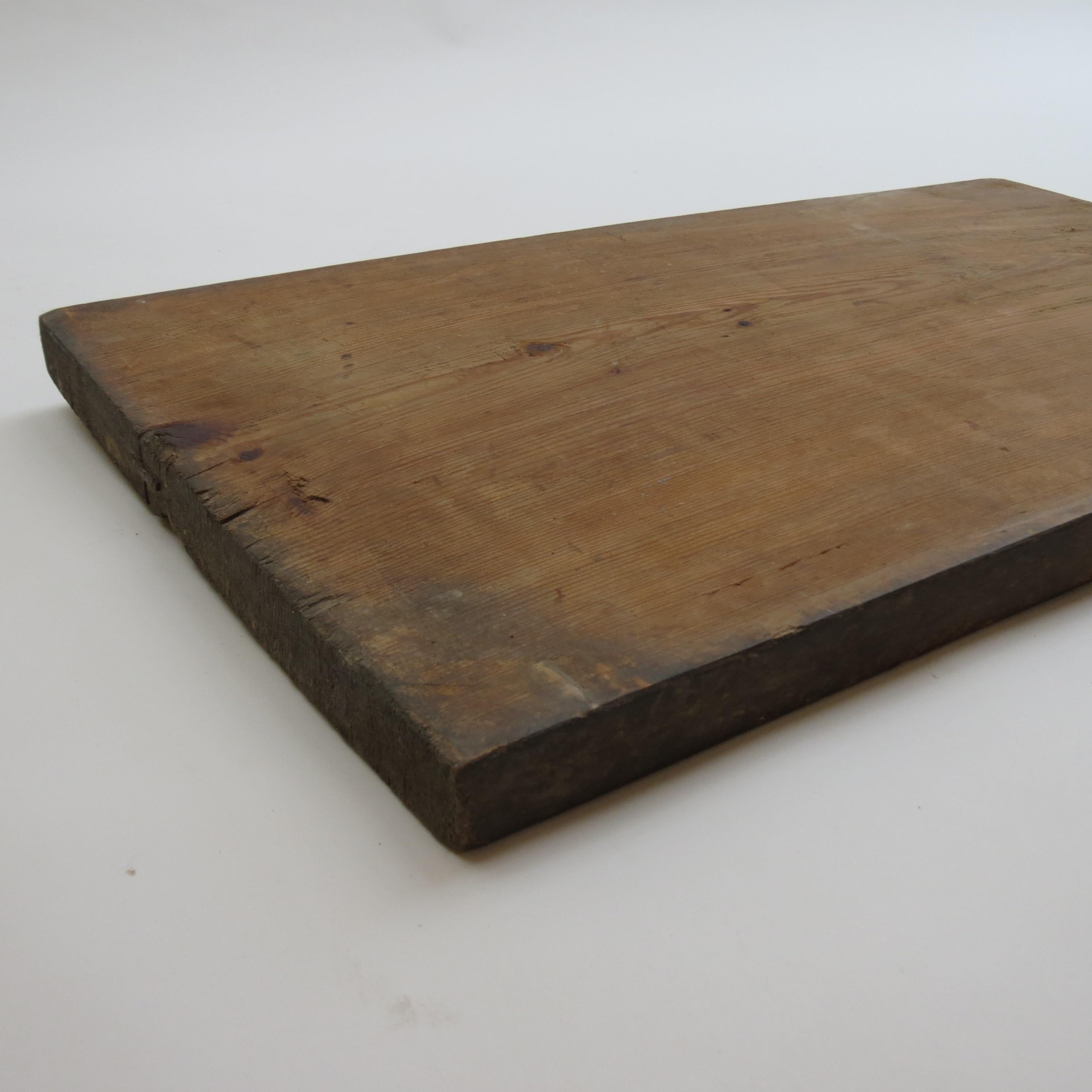 Large vintage wooden chopping noodle board Japanese origin

Very large vintage wooden chopping board originally used as for chopping noodles. Heavily distressed and patinated. 

Measures: 76cm x 45cm x 3.5cm thick 
st1163.



  