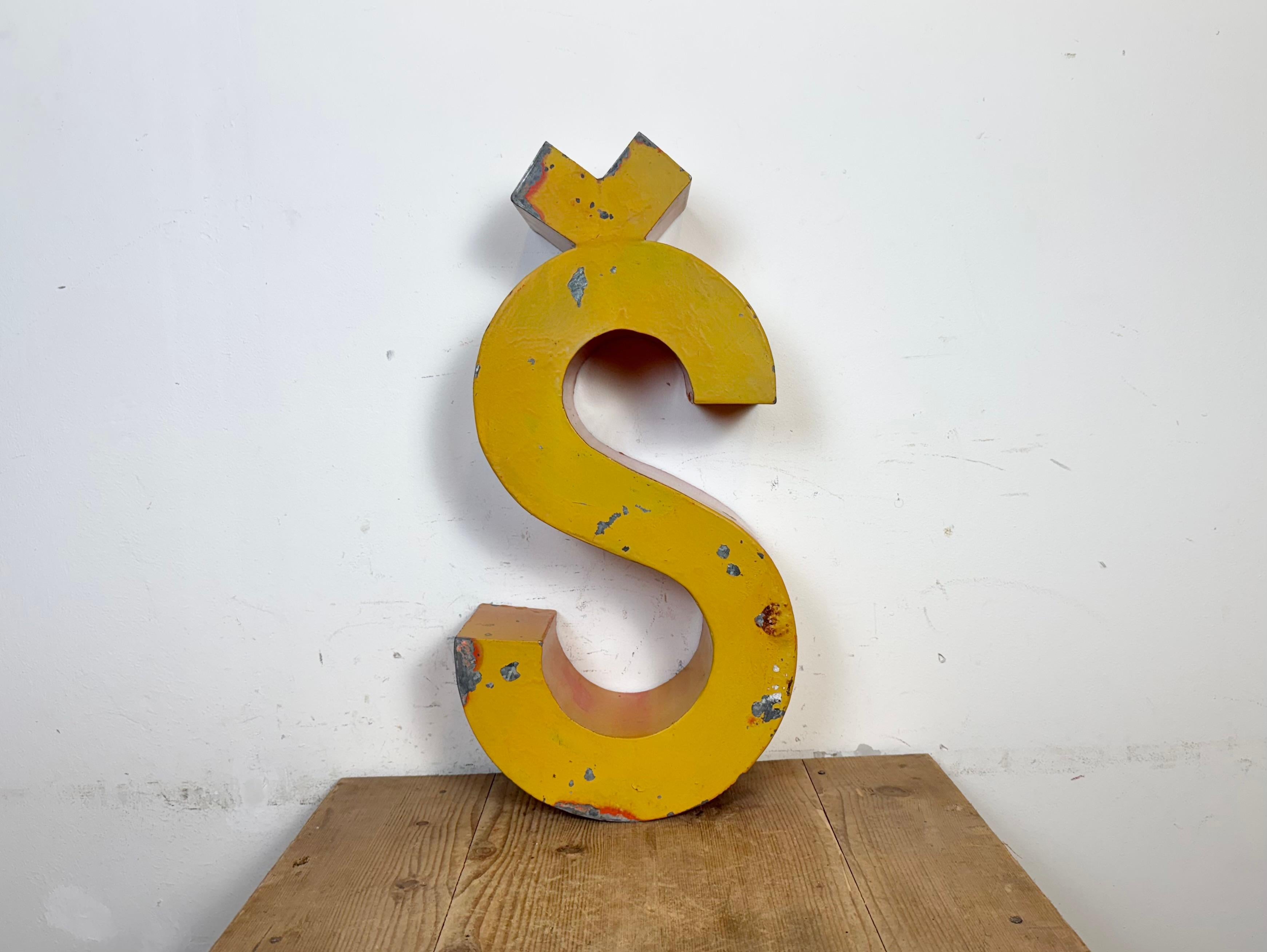 This vintage industrial facade letter “Š” was made during the 1960s  in former Czechoslovakia and comes from an old inscription POŠTA. In czech language Post Office. The weight of the letter is 6,3 kg.