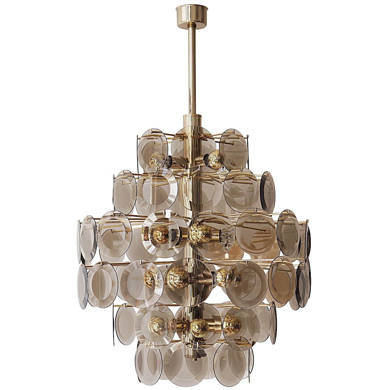 Large Italian Murano glass chandelier with 71 glass discs.
24 E27 Bulbs.
Total height with suspension bar 122 cm.
Height fixture with glasses is 80 cm.
