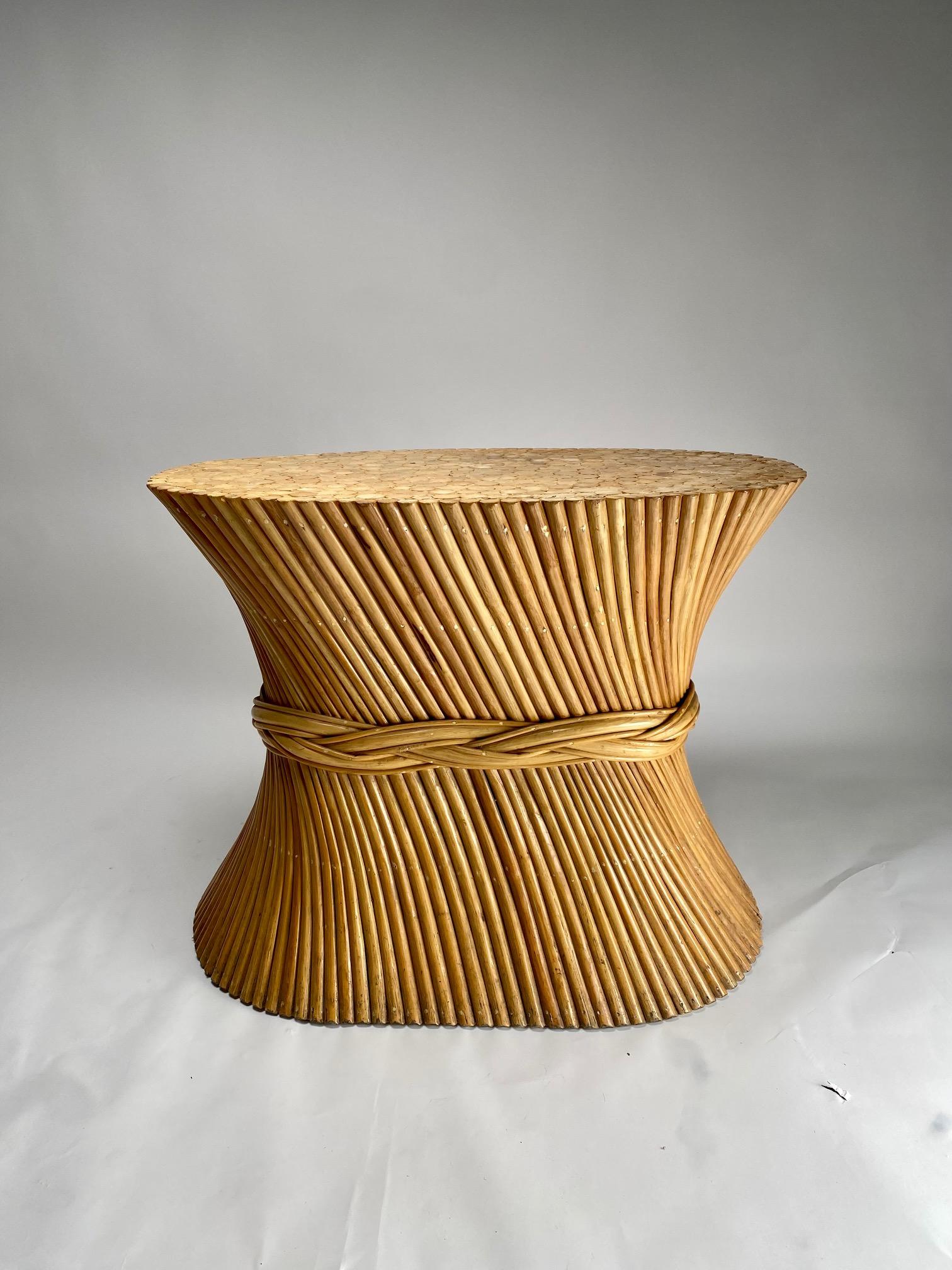 An elegant 1970s elliptical bamboo table made in the image of a wheat honeycomb, you can choose a round or oval shaped glass top. Vivai del Sud, Italy, 1970s