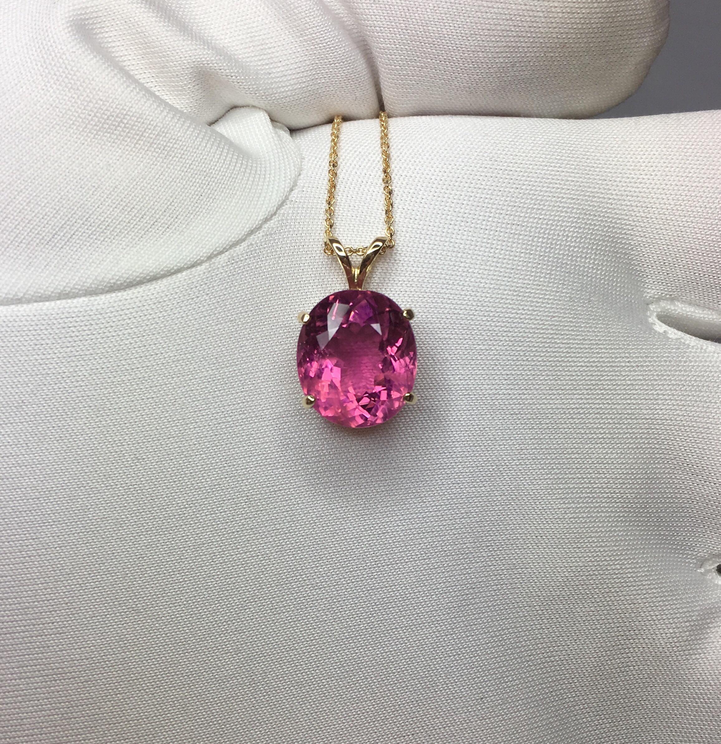 Beautiful large natural 6.10 carat vivid pink Rubellite tourmaline set in a fine 14k yellow gold solitaire pendant.

Stunning tourmaline with a vivid pink colour and good clarity, some inclusions when looking closely, as to be expected with a