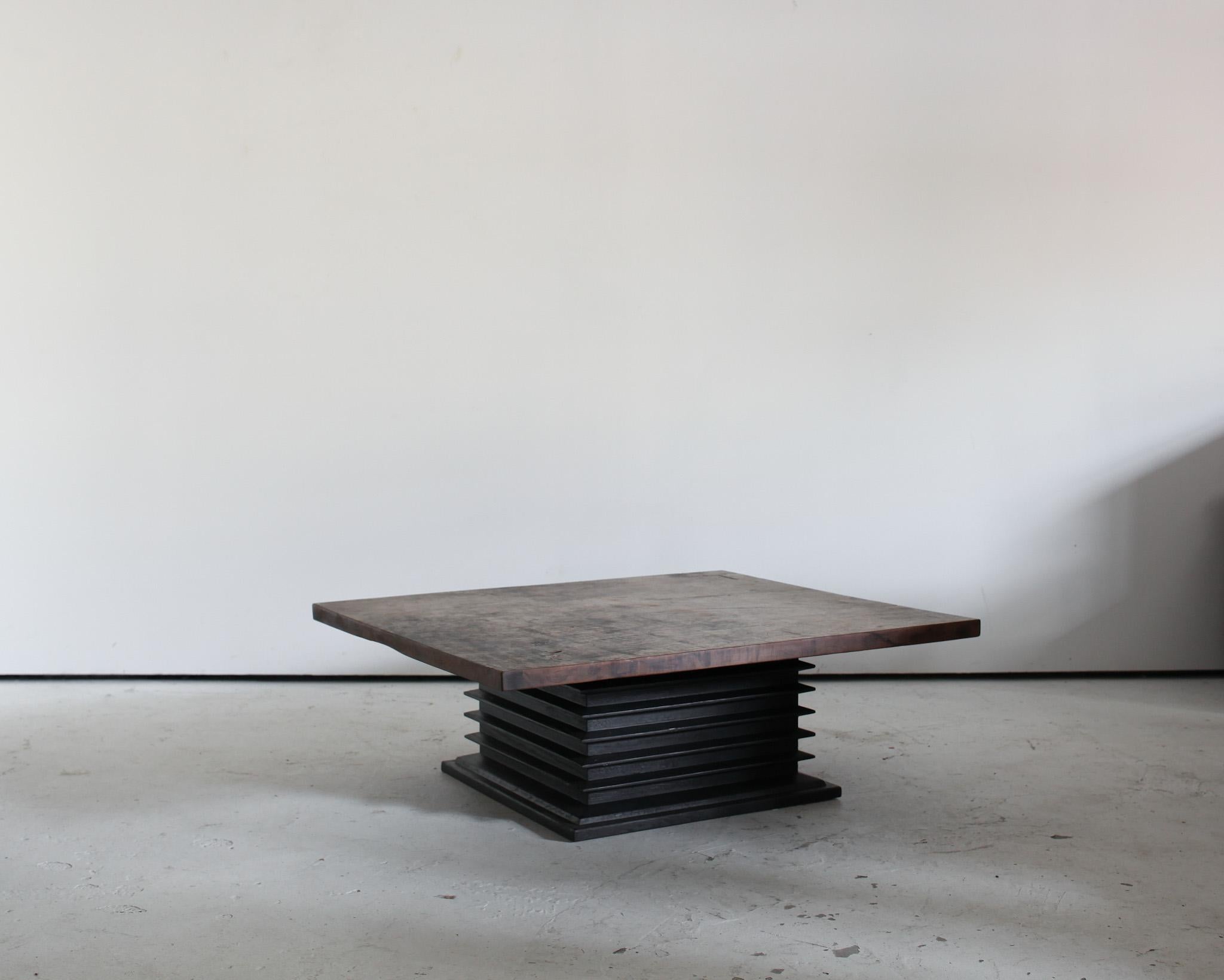 A unique, large charred Japanese coffee/tea table.

Heavily patinated top on sculptural charred base.

Made using 19th C. Elements in our London workshop.