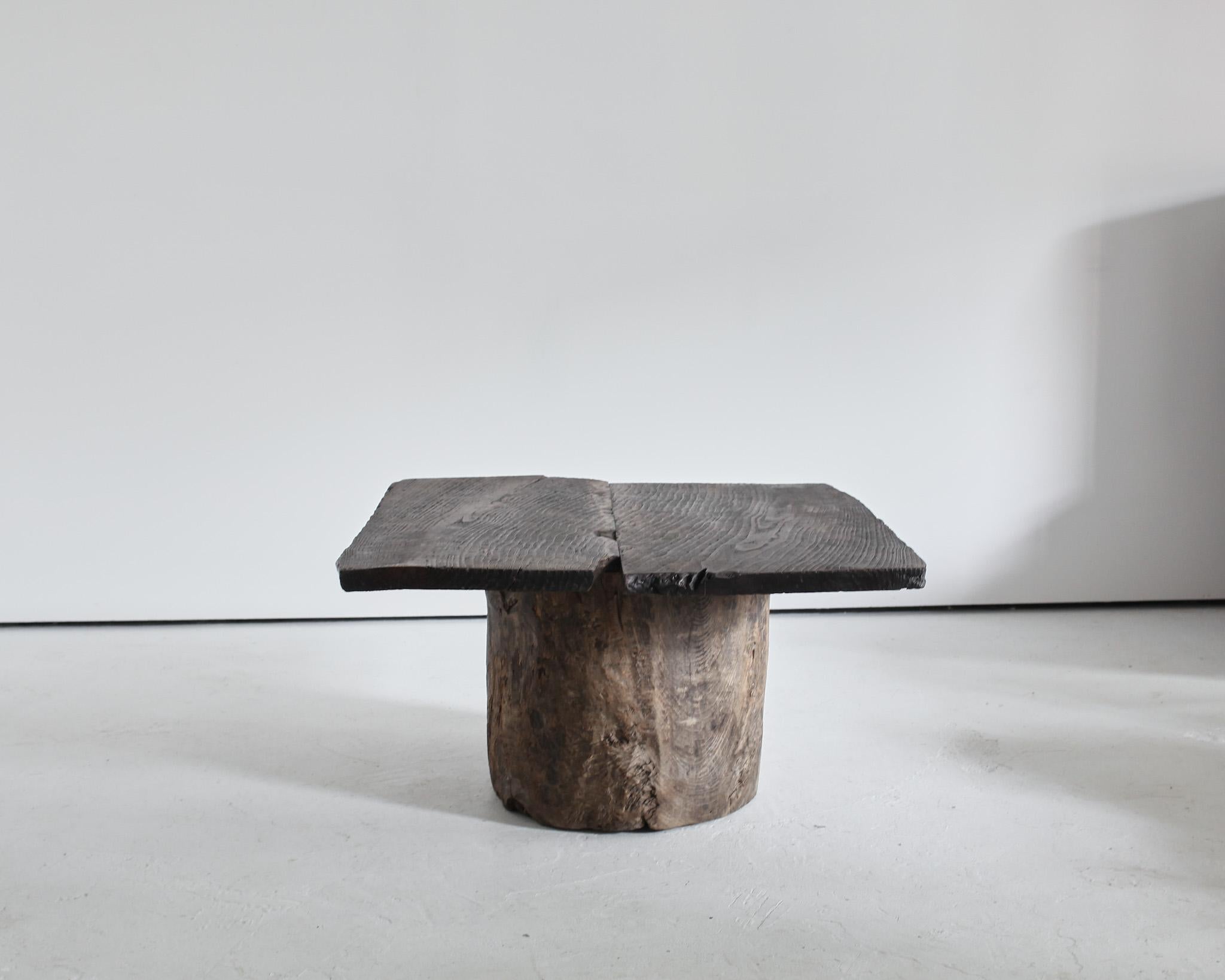 A unique, large dug-out Japanese coffee table.

Heavily patinated two piece cedar top on heavily patinated dug-out cedar base.

Made using 19th C. Japanese elements in our London workshop.