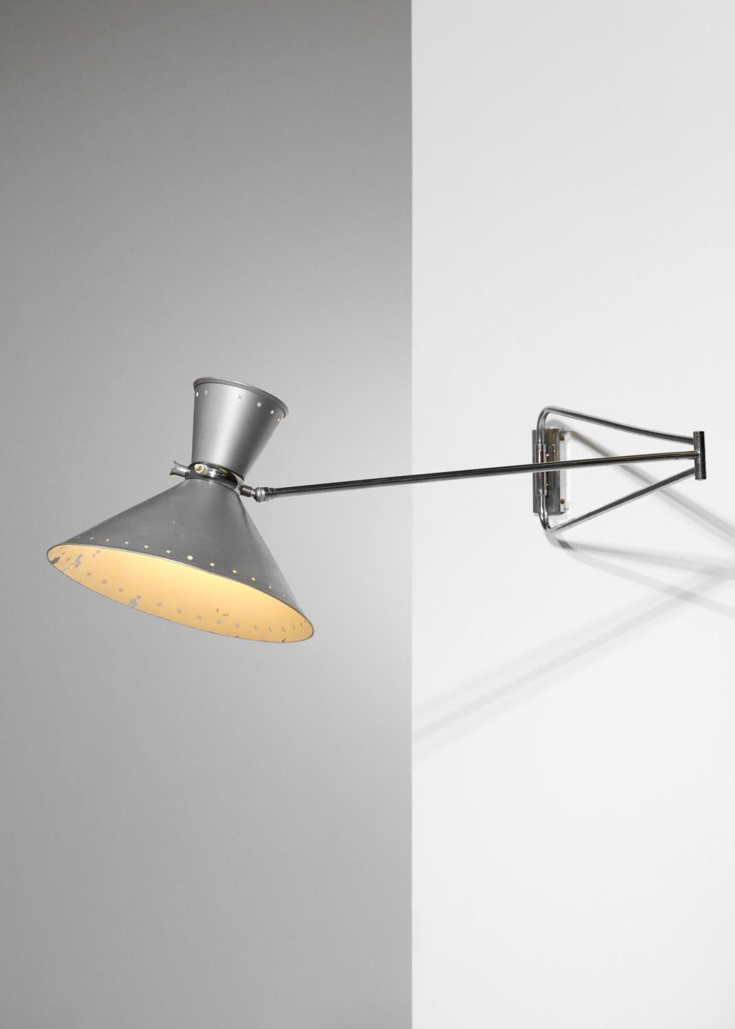 Grande lampada da parete Lunel in metallo cromato con stelle traforate degli anni '60 - in vendita 2