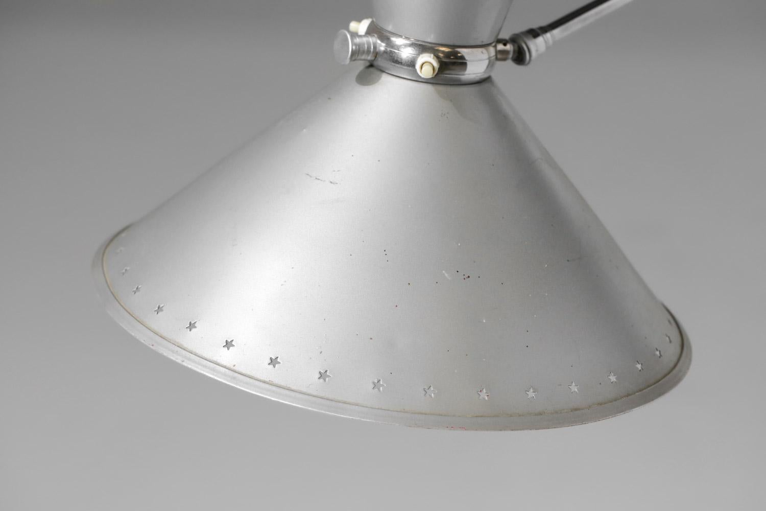 French Large wall lamp Lunel chrome plated metal with perforated stars from the 60's -  For Sale