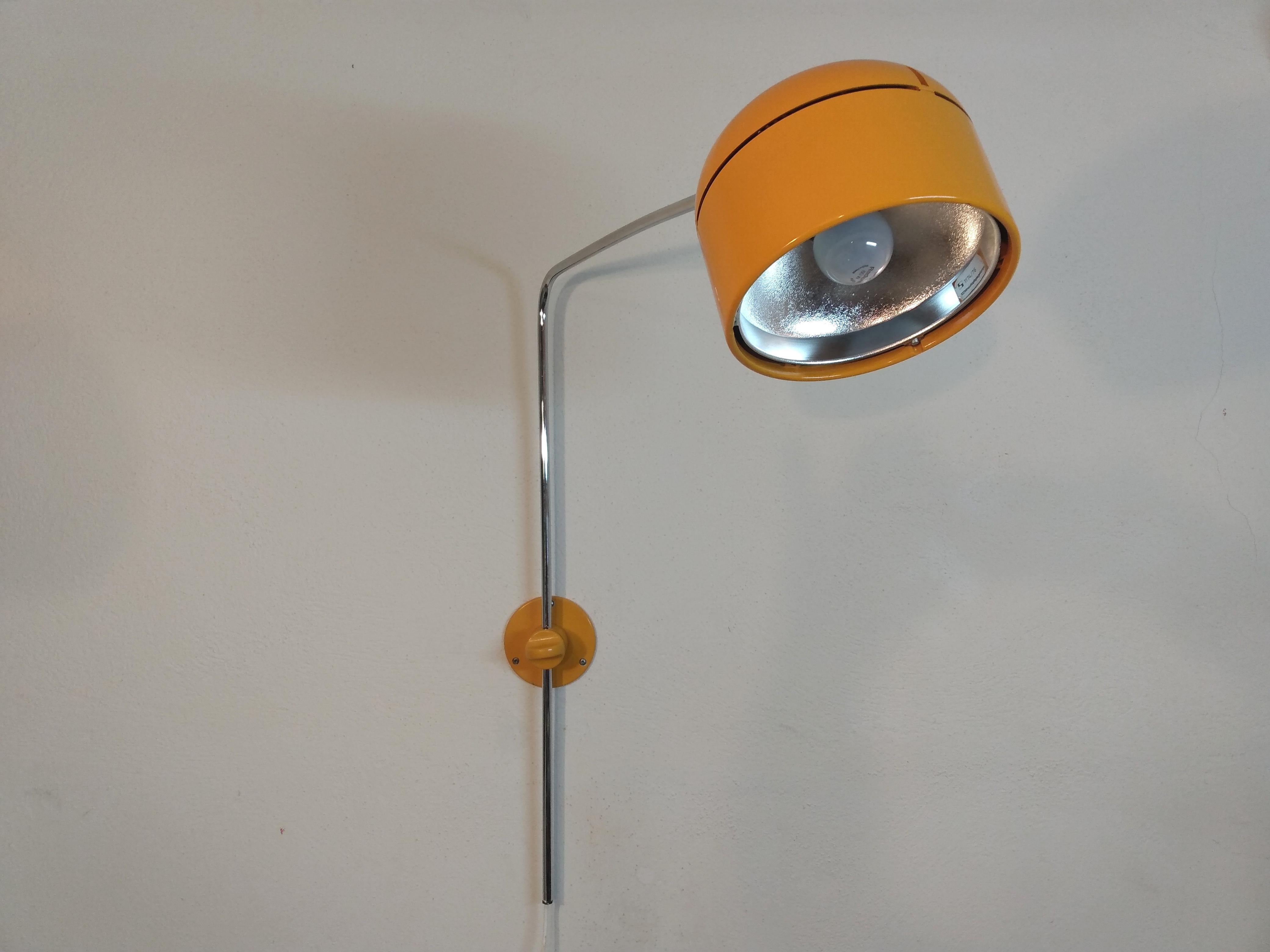 Large wall lamp with swivel arm, 1970s.
Company Staff, model no. 1174/76 - design Arnold Berges - the pendant lamp of this series won the if design award in 1973, see last picture.

Exceptional light from the traditional company Staff from West