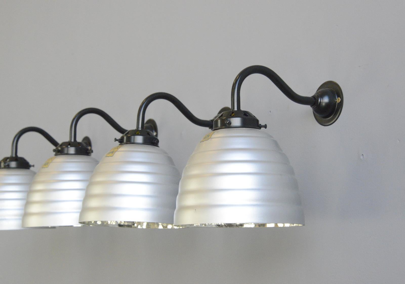 Large wall mounted mercury glass lights by Gepe, circa 1930s

- Price is per light 
- Mercury glass shade
- All branded Gepe 
- Takes E27 fitting bulbs
- Wires directly into a wall feed
- German, 1930s
- Measures: 18cm wide x 25cm deep x