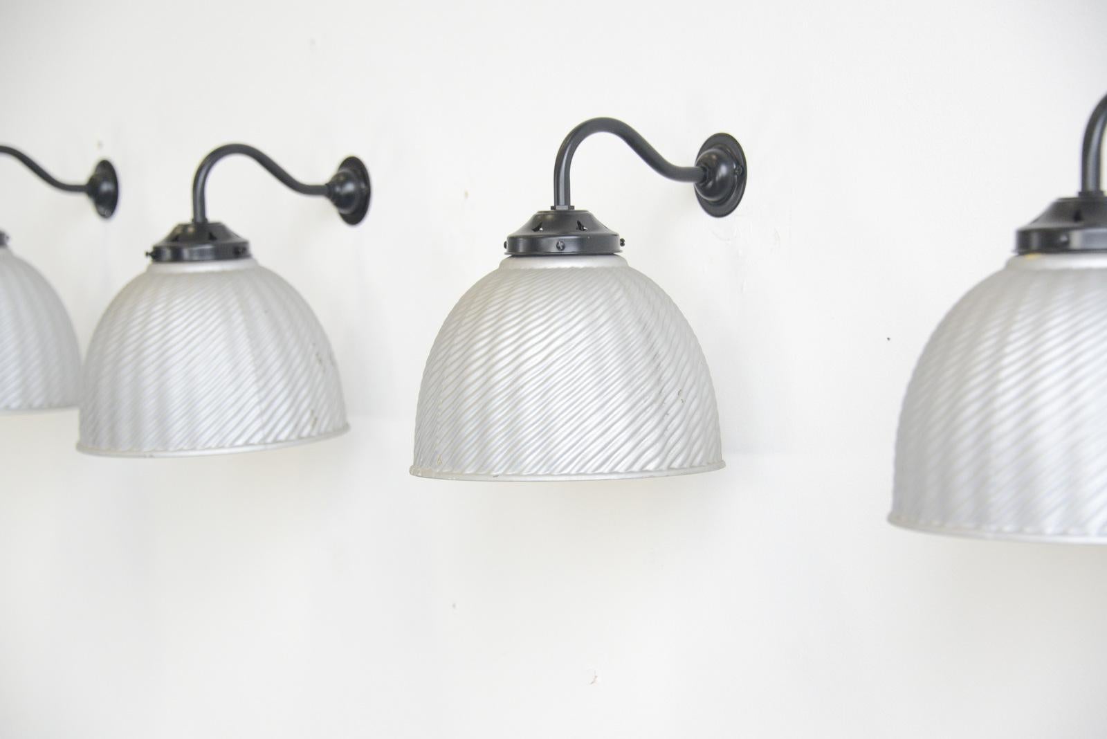 Large wall-mounted mercury glass lights, circa 1930s

- Price is per light
- Ornate mercury shades
- Original silver paint on the outside
- Black steel wall brackets
- Takes E27 fitting bulbs
- Czech ~ 1930s
- Measures: 24cm wide x 27cm deep