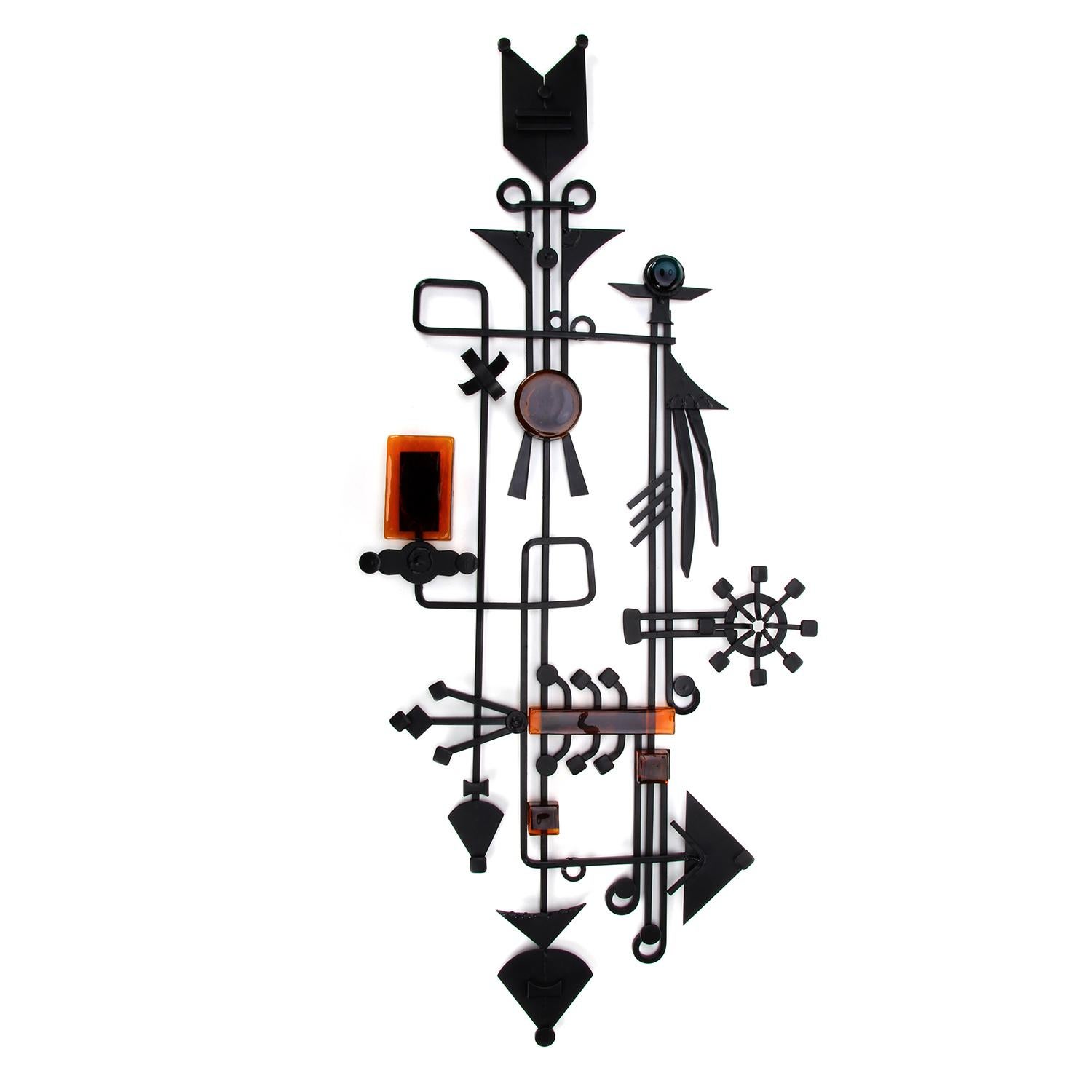 Large relief by Dantoft Kunstsmedie, Denmark, circa 1960s. Unique artisan work in welded metal with orange glass pieces in very good vintage condition.

Wondrous collage of imagination and geometric shapes - materialized in welded metal with black