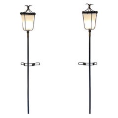 A Pair of Large wall sconces Torchères by Jacques Adnet, circa 1950.