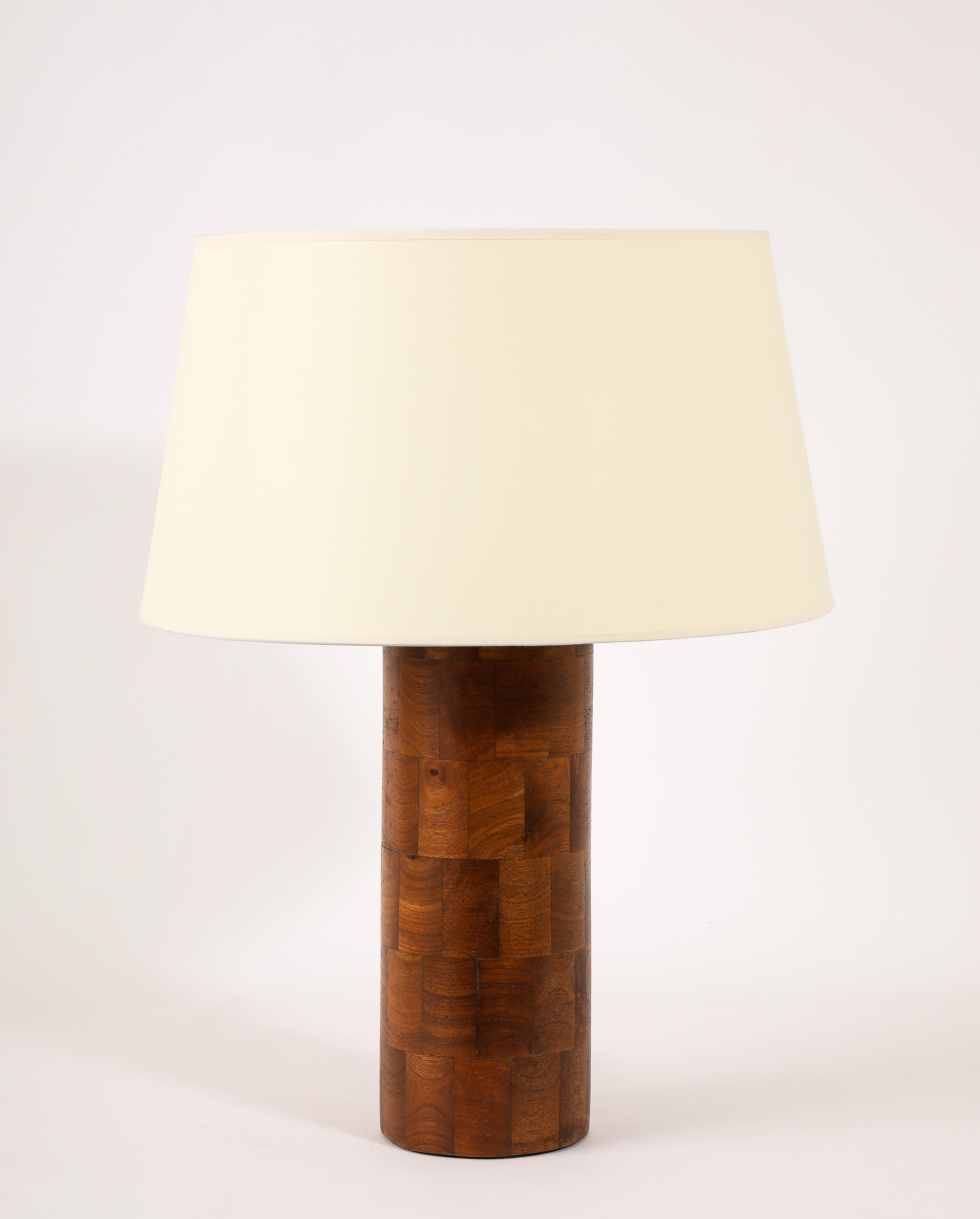 cylindrical table lamp made of turned walnut blocks.
Base size only 19x2
