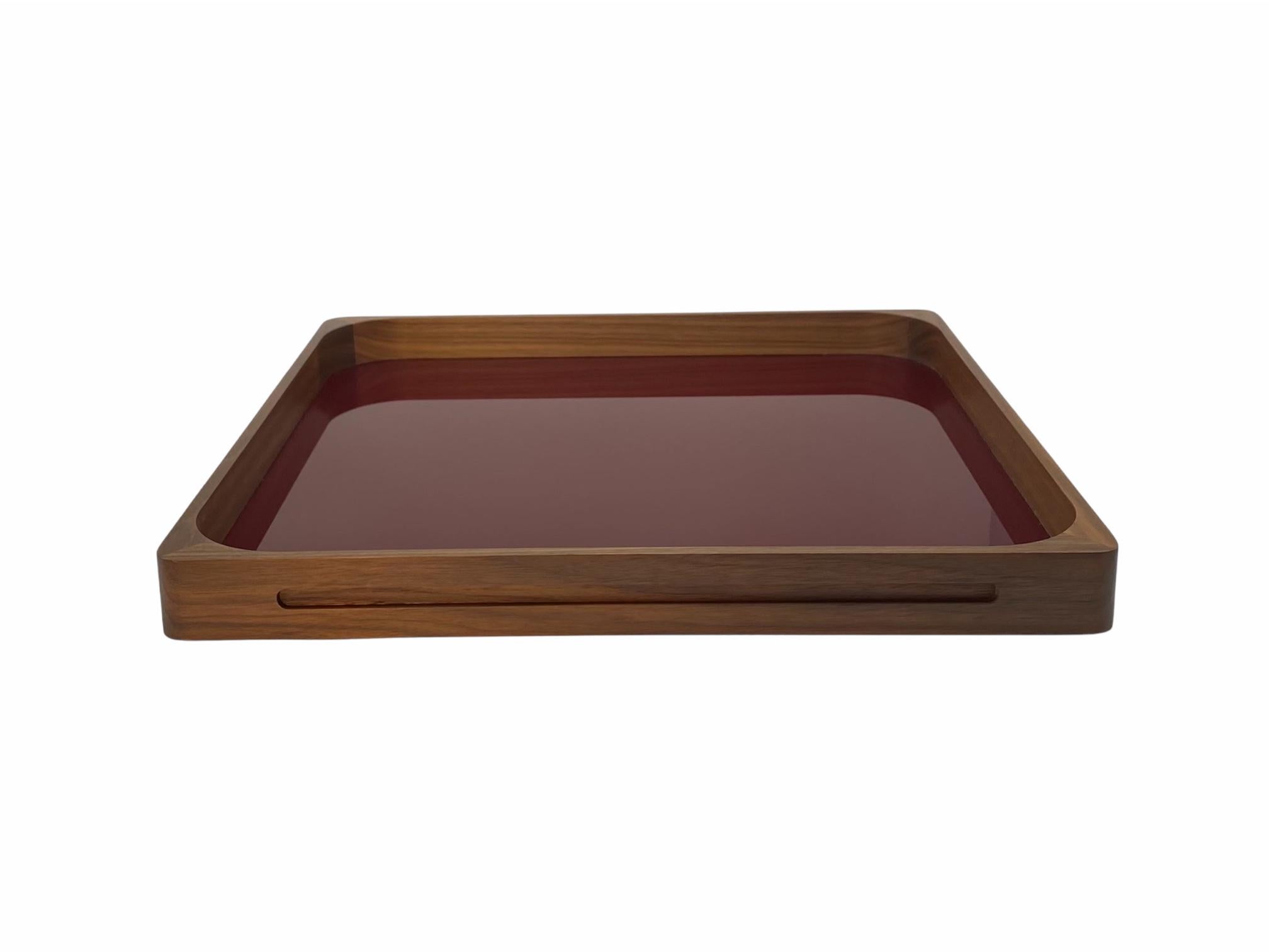 This classic, yet modern, craftsmanship based tray is made out of walnut wood and acrylic and was designed by GS in 2004. It can be used by clients as a cocktail tray as well as a very modern and practical serving tray, making it the perfect gift.