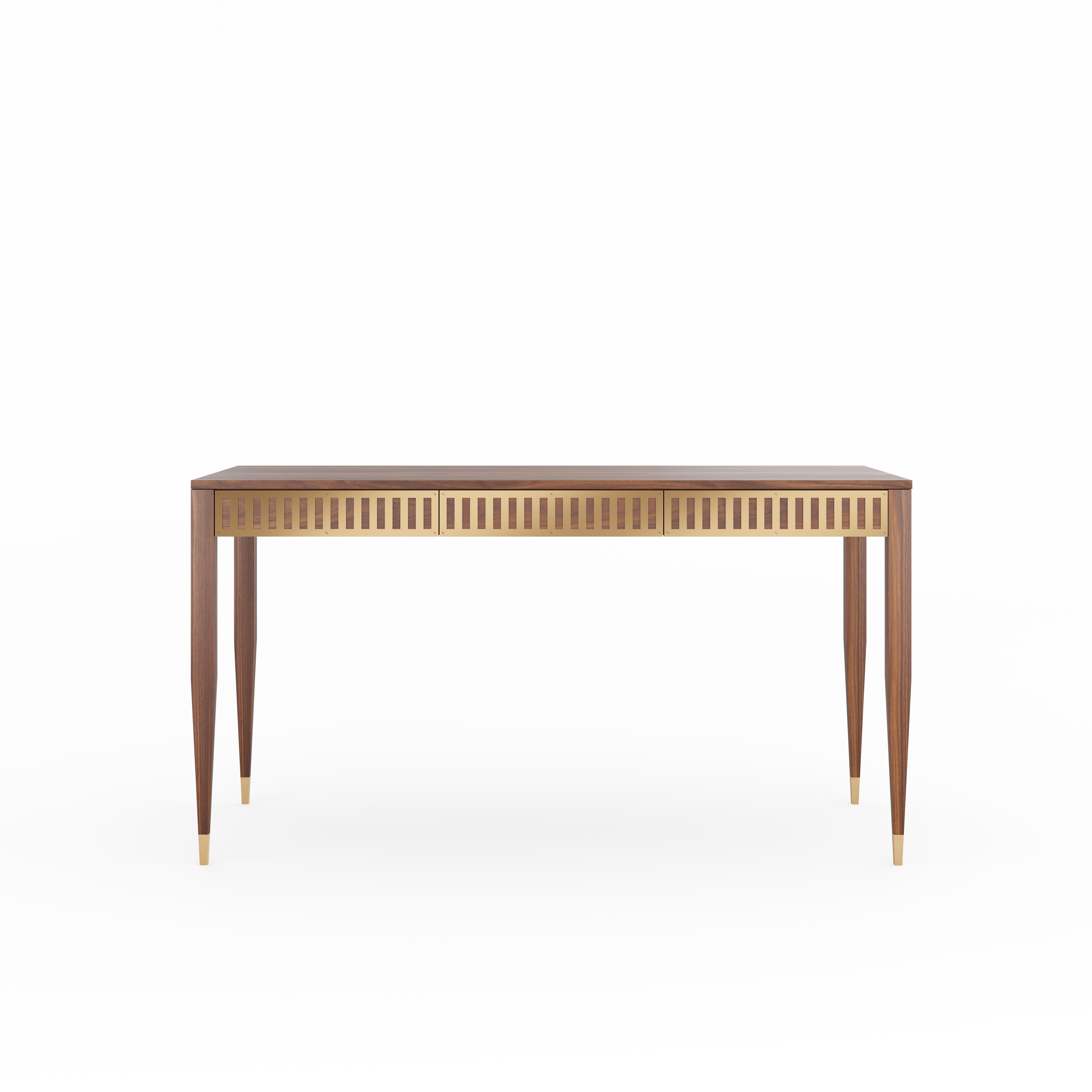 Desk in mid-century style with three drawers with brass fronts. The tapered legs are finished with brass plated aluminum feet. Desk made of solid American walnut wood and wood covered with natural American walnut veneer. Other wood on request.