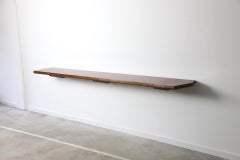 Large walnut wall console by Osvaldo Borsani for Tecno, Italy 1950s