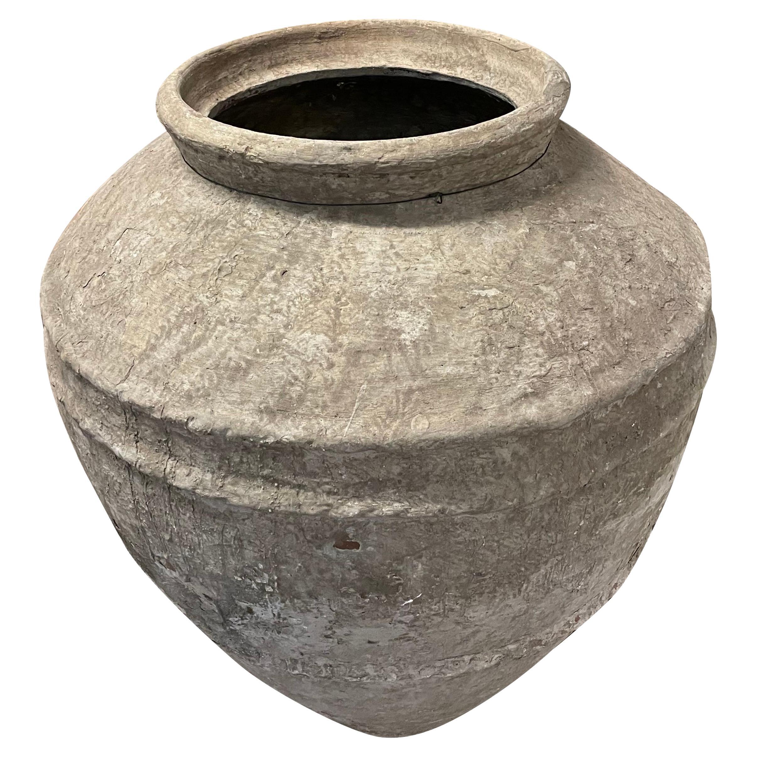 1920's Chinese large water vessel.
Raised twisted decorative bands.
Beautiful natural patina.
One of several from collection.
ARRIVING NOVEMBER.