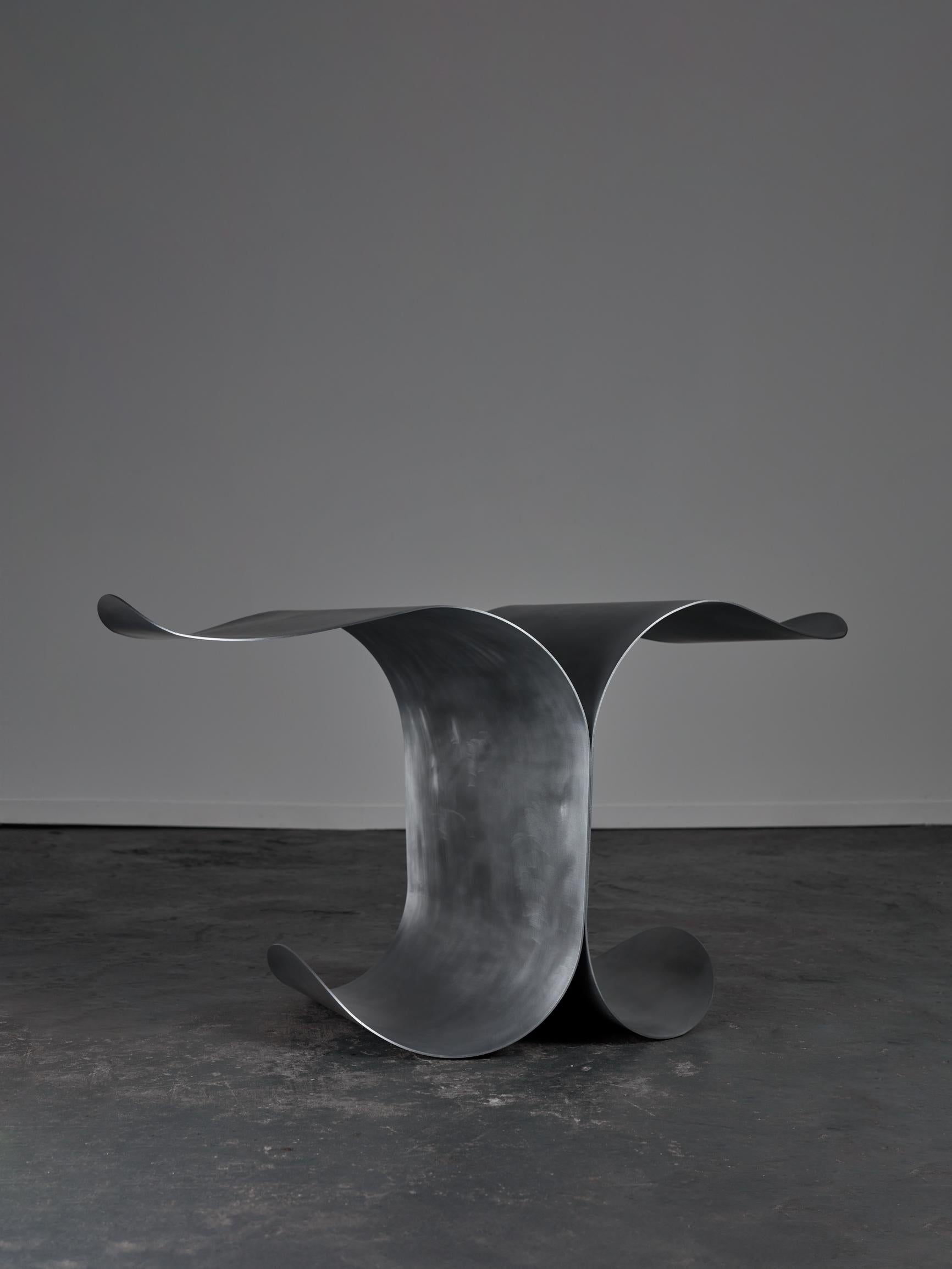 Large Waves Side Table by Yoon Shun
Dimensions: D 60.5 x W 109 x H 58 cm. 
Materials: Aluminum and silicone. 

This side table is made of 3MM aluminum. Hands machine rolled, polished, and silicon coated. Available in three different sizes and in a