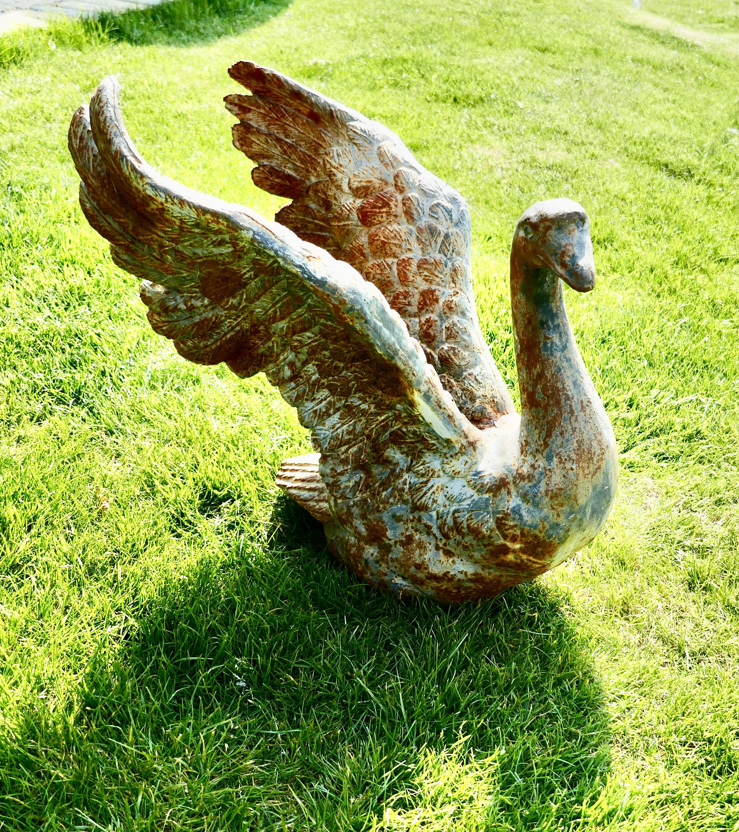 Country Large Weathered Cast Iron Statue of a Swan Landing For Sale