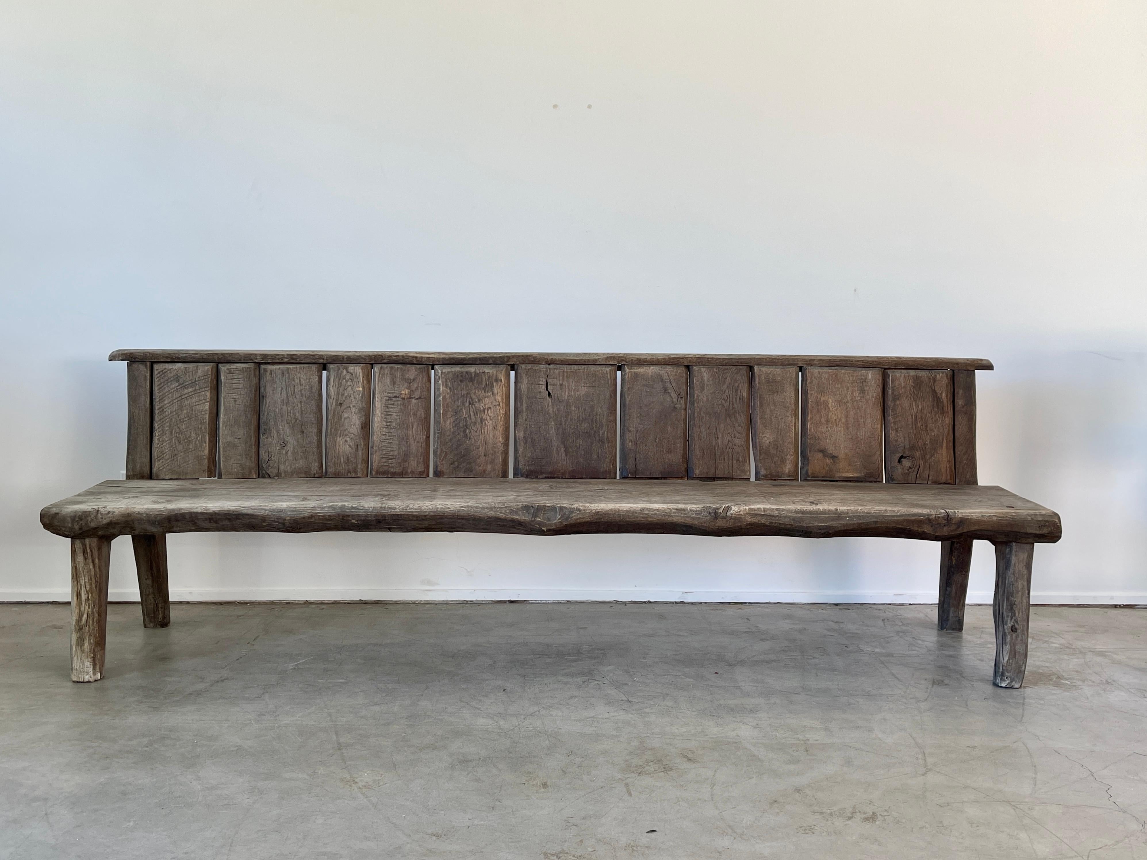 Huge French rustic bench in weathered oak with plank slatted back, circa 1950's 
Seats are one solid piece of oak - 3