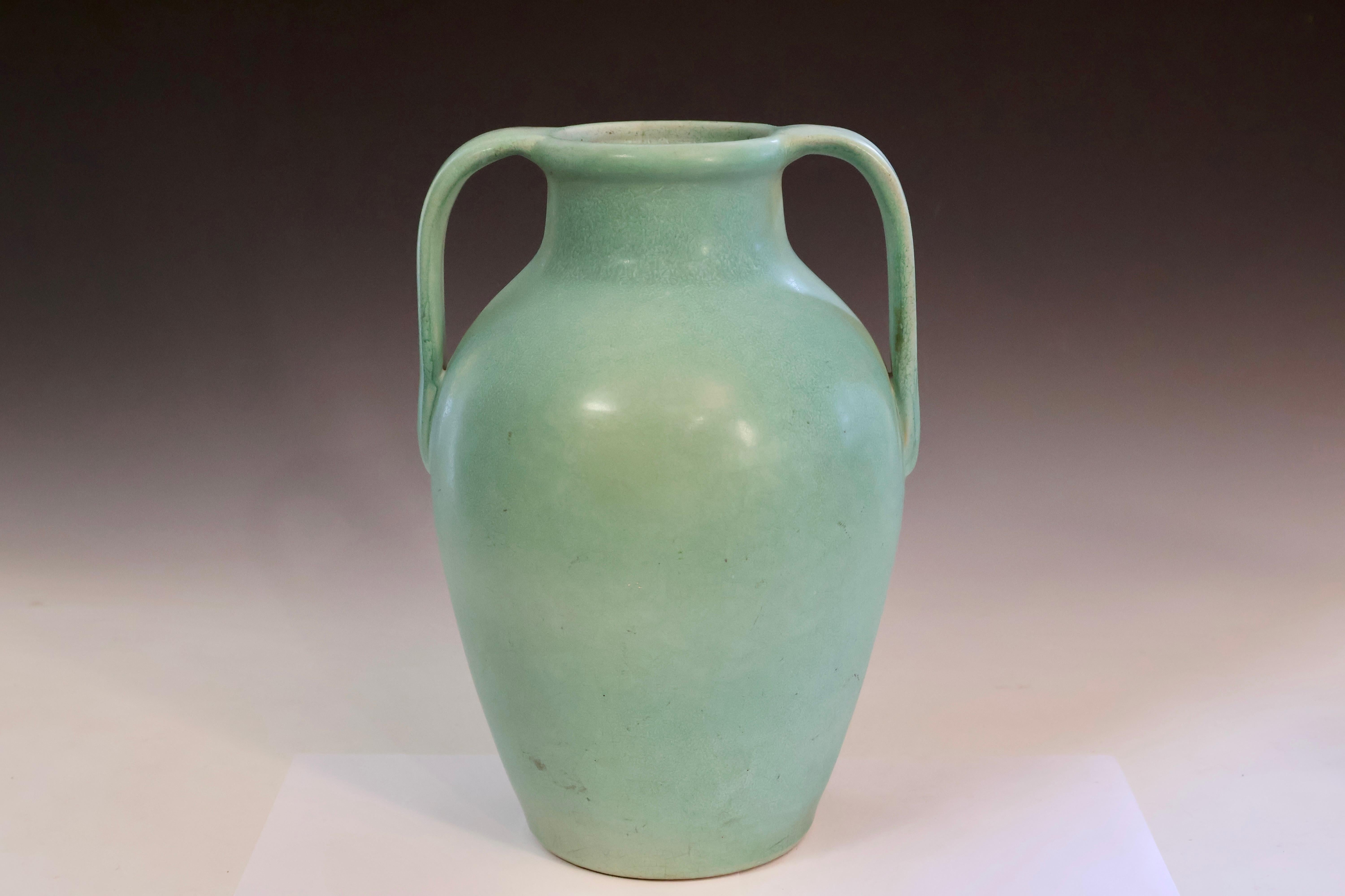 Vintage Weller Evergreen vase, circa 1930. Design attributed to Stoin M. Stoin. Simple urn form with delicious mottled, satin matt, light green glaze. Incised 