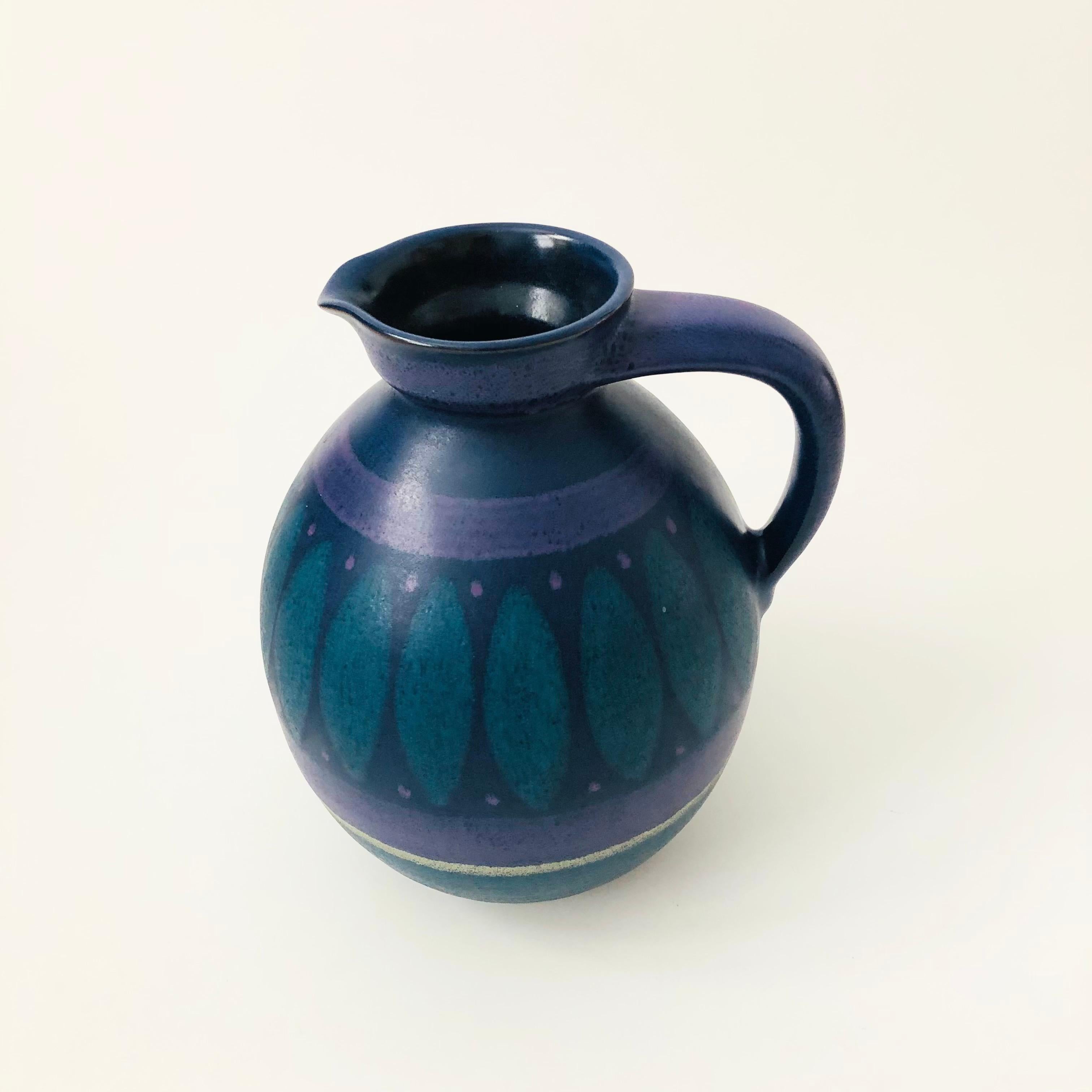 A large 1970s West German art pottery pitcher. Made by KMK (Kupfermühle Keramik) in the 
