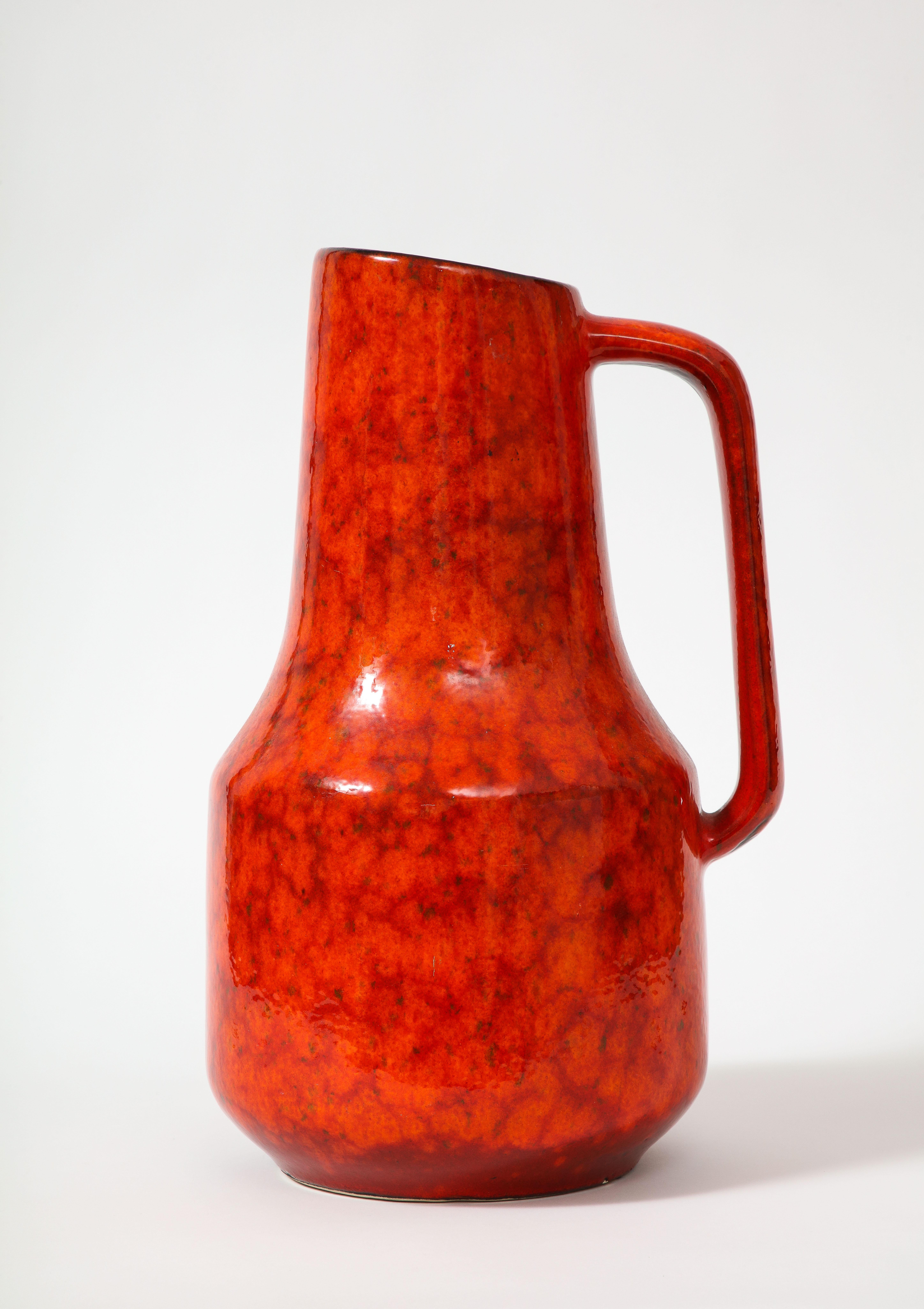 Bright Red Lava Glazed Pitcher with Black glazed interior from West Germany, this shape + size was Introduced by Scheurich Keramik in 1974.