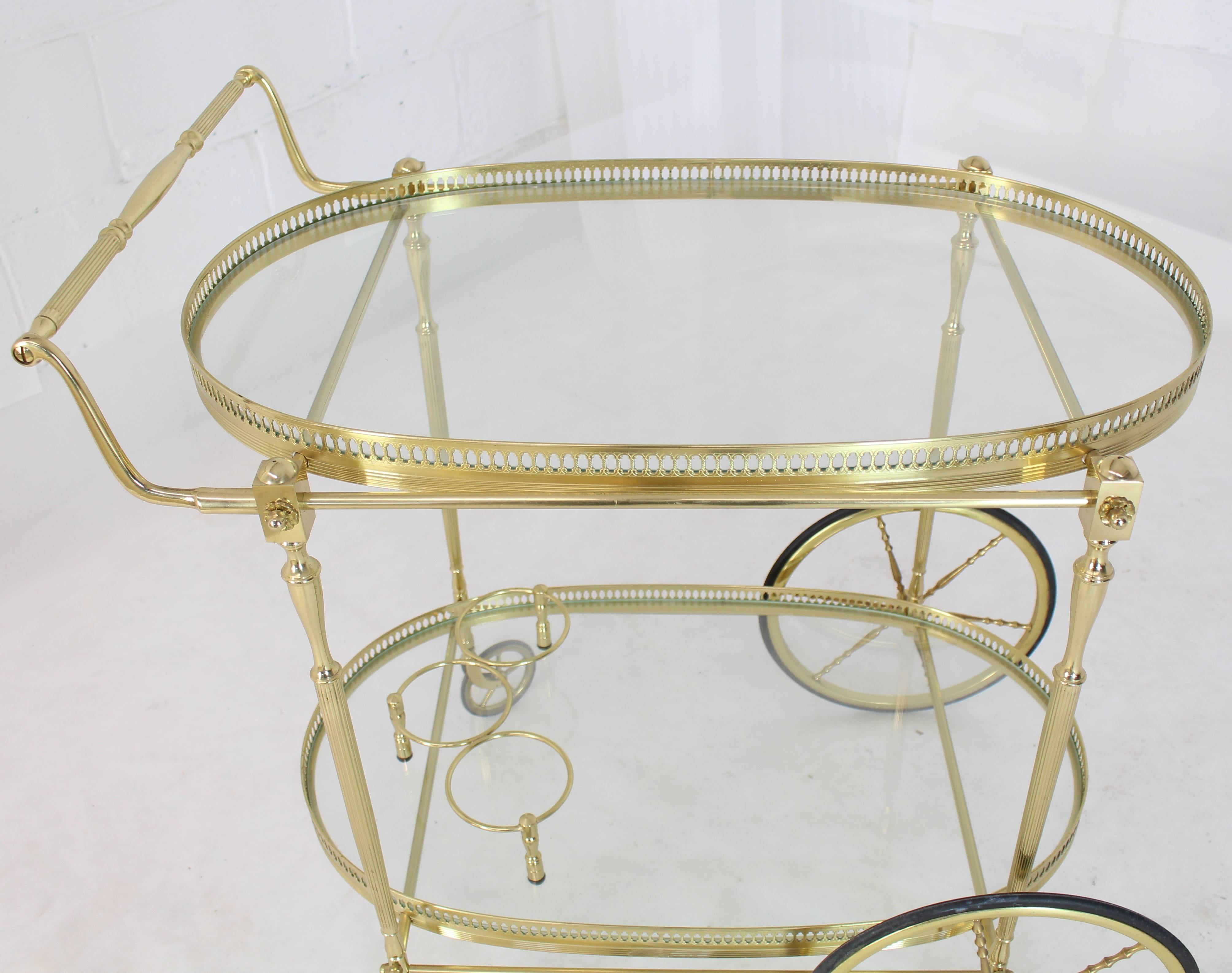 Very sharp looking solid brass tea bar cart serving table.