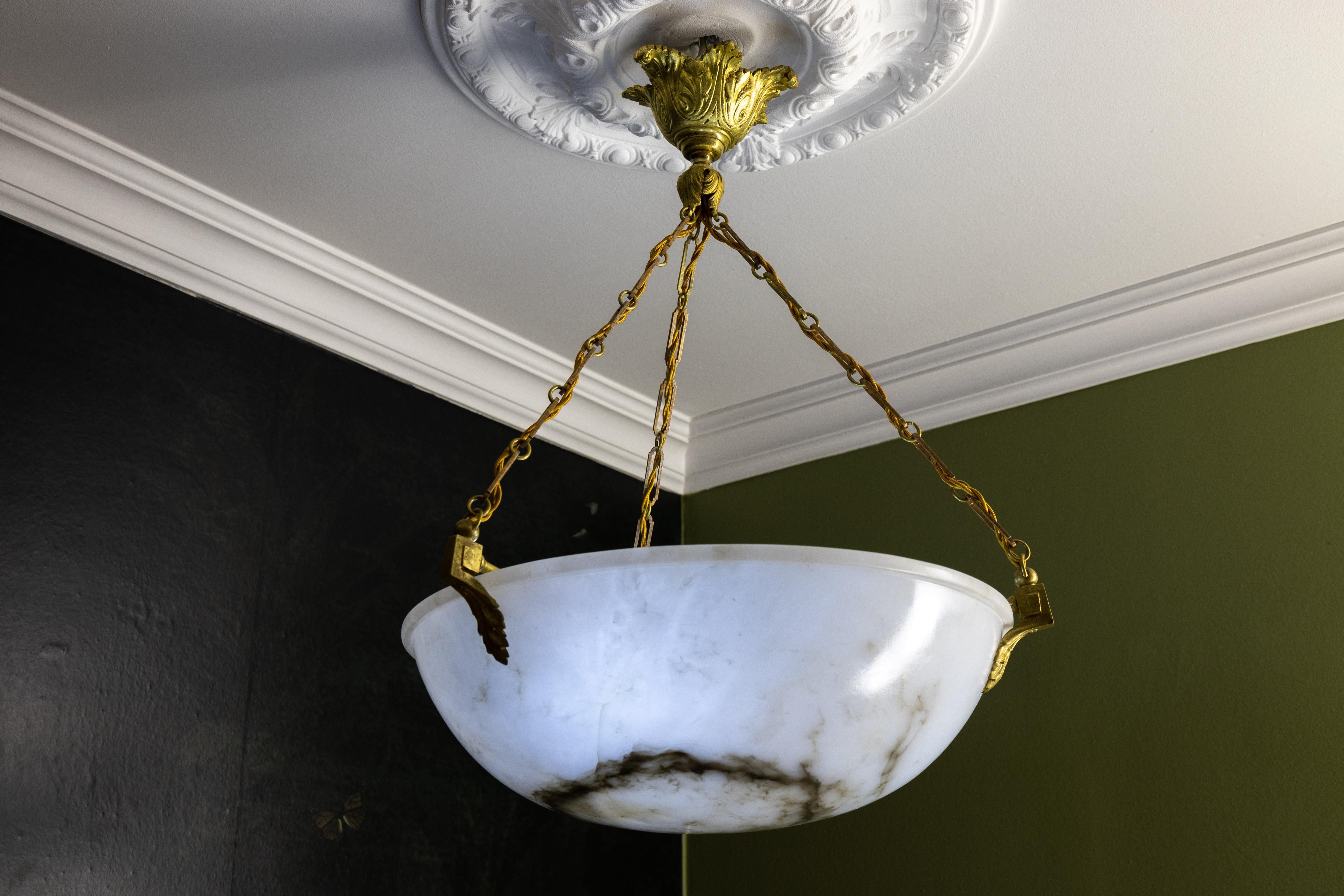 Early 20th Century Large White Alabaster with Black Veins & Bronze Pendant Chandelier, ca. 1920 For Sale