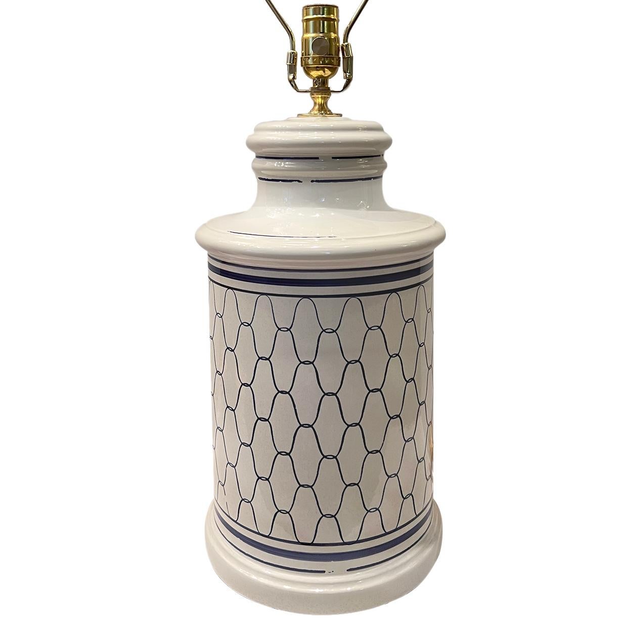A circa 1950's Italian white and blue porcelain lamp.

Measurements:
Height of body: 17