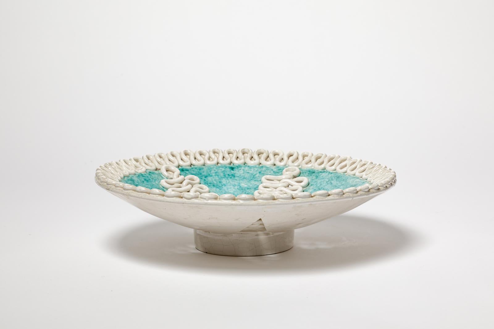 Gustave Asch - Sainte Radegonde

Grande piatto in ceramica art déco bianco e verde

Firmato 

Condizioni originali perfette

altezza 9 cm
Grande 35 cm