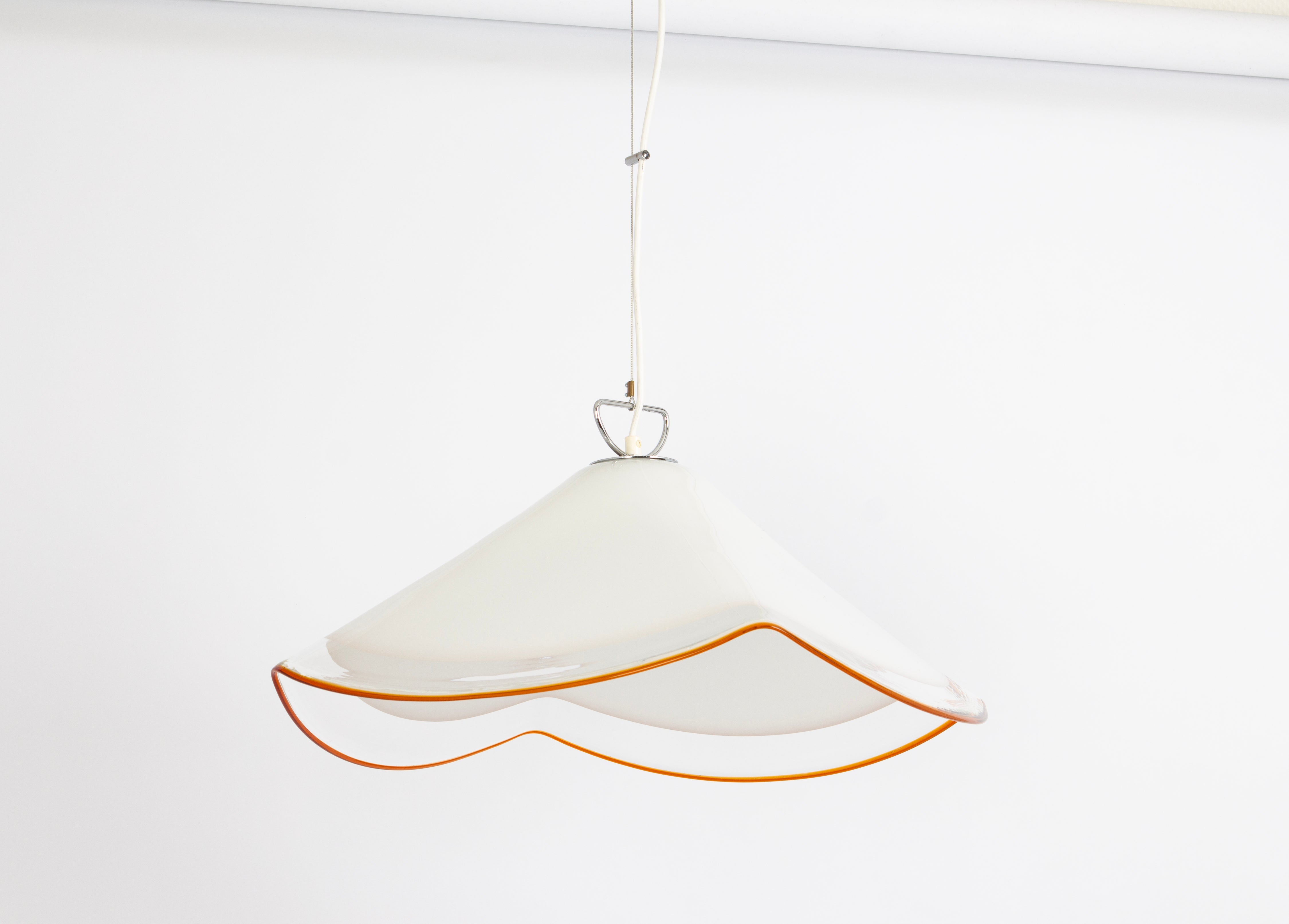 Stunning glass Pendant light by Kalmar -Name of this Serie: Fazzoletto , made in the 1970s
Nice structured glass, beautifully refracting the light.
High quality and in very good condition. Cleaned, well-wired and ready to use.
There are small spots