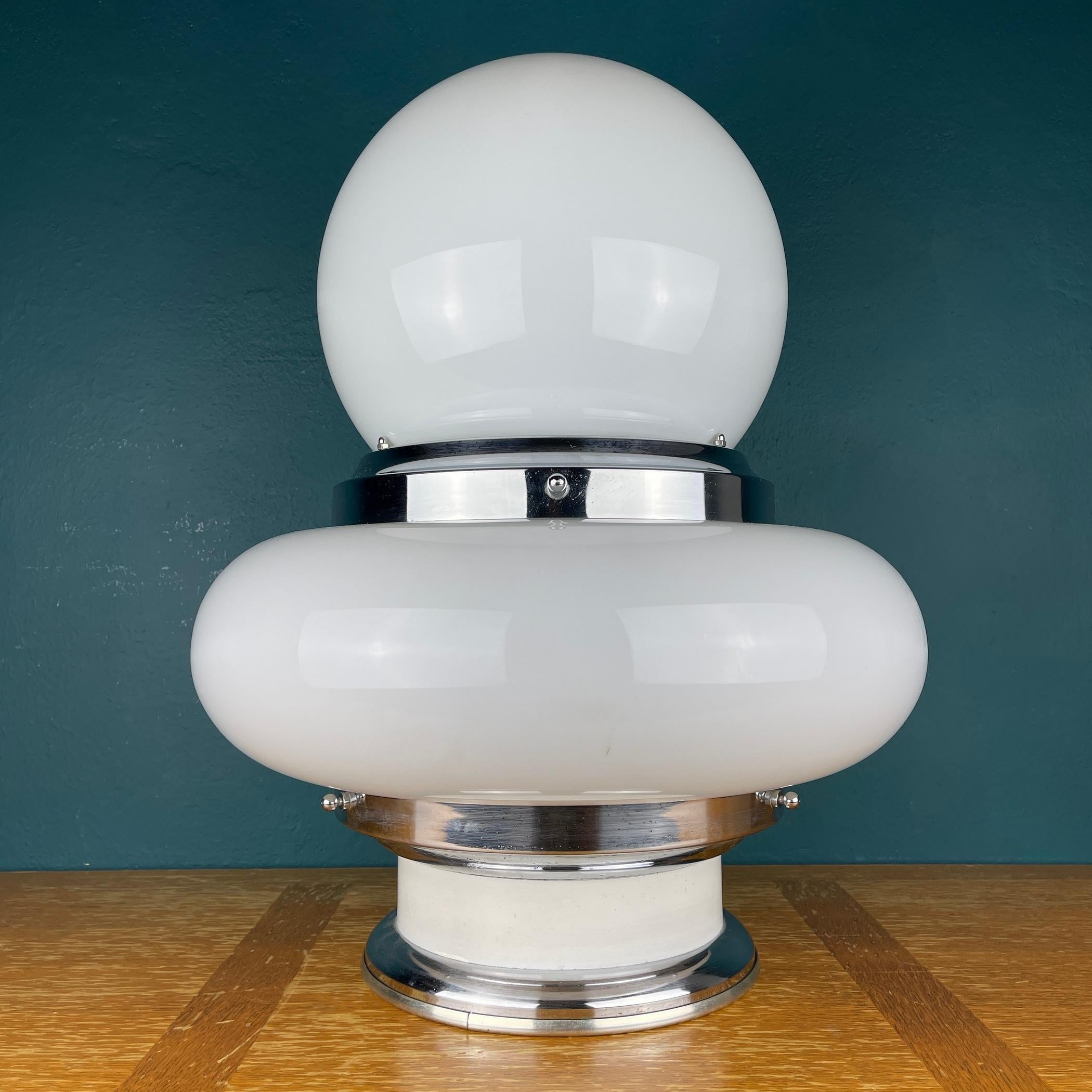Vintage large white opaline glass table or floor lamp UFO was made in Italy in the 1970s. Retro lamp will bring to your home the atmosphere of 70s Italy, the era of the space age. A mid-century table lamp will look great in an Art Deco or