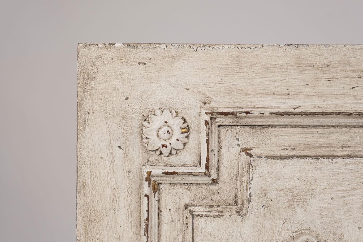 Large white painted architectural panel feature swaged garland motif, (late 19th century, France). Later paint.
