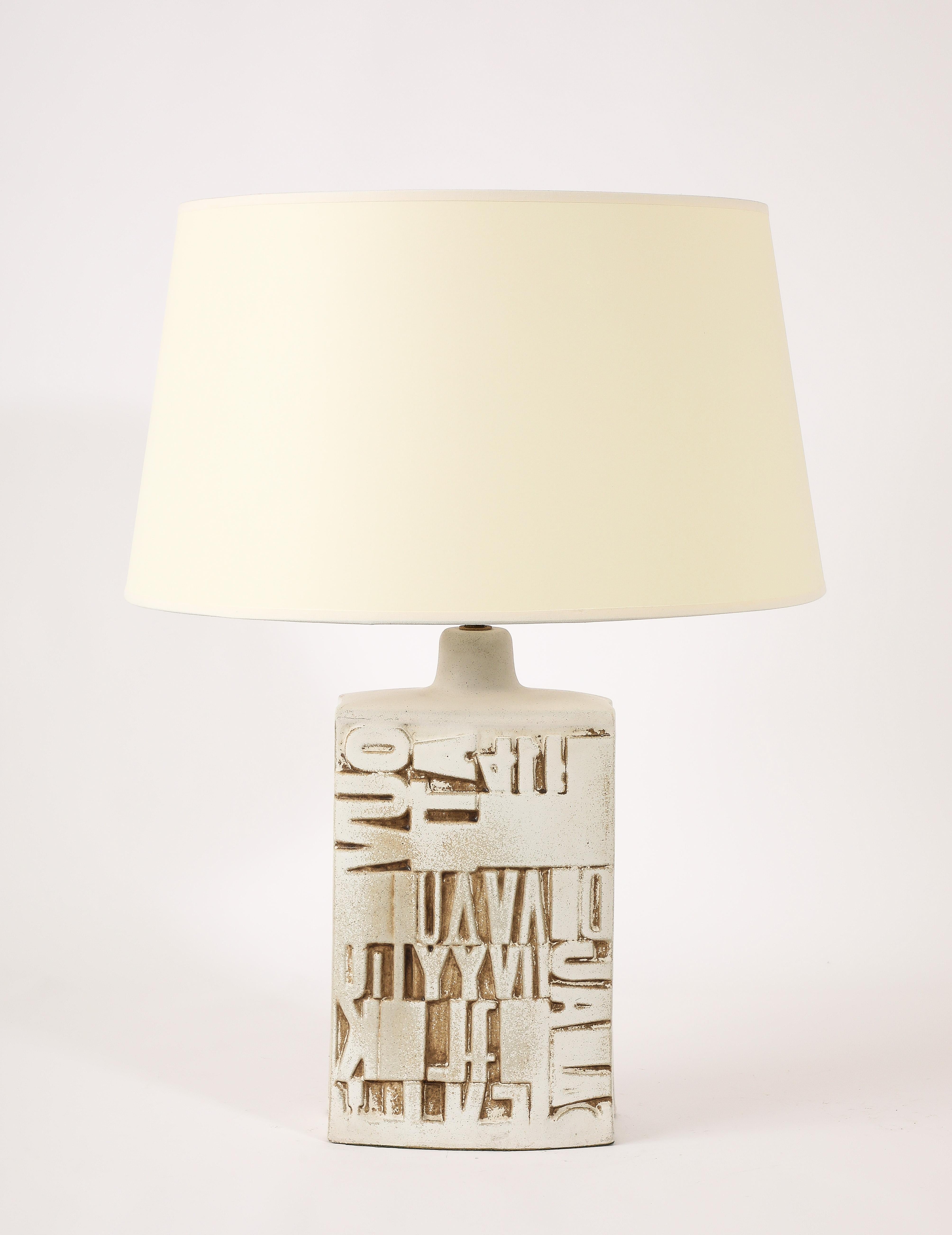 Large white glazed “Scraffito” Table lamp. Base size only
18x9x4.

