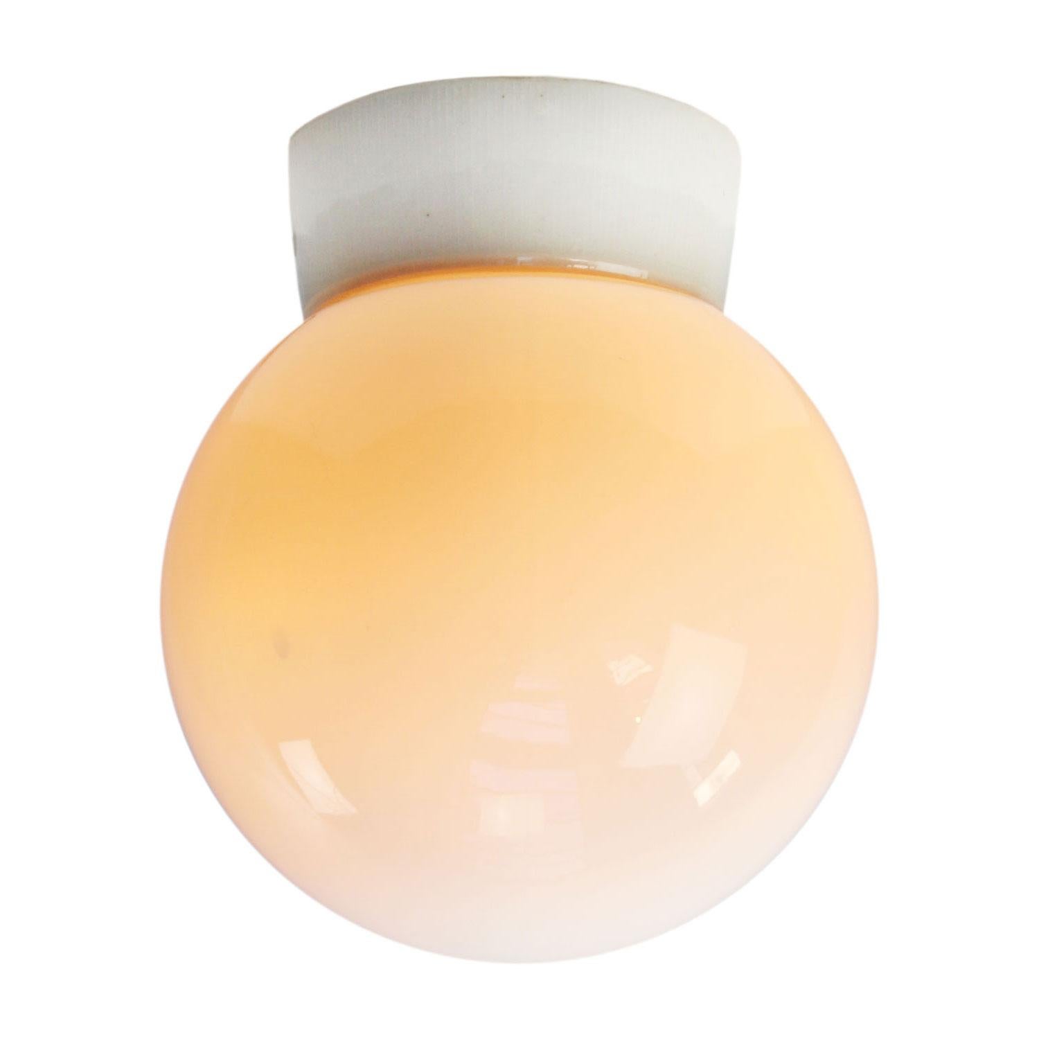 Industrial ceiling lamp.
White porcelain, white opaline glass.
2 conductors, no ground.
Measures: Diameter foot 12 cm

Weight: 1.30 kg / 2.9 lb

Priced per individual item. All lamps have been made suitable by international standards for