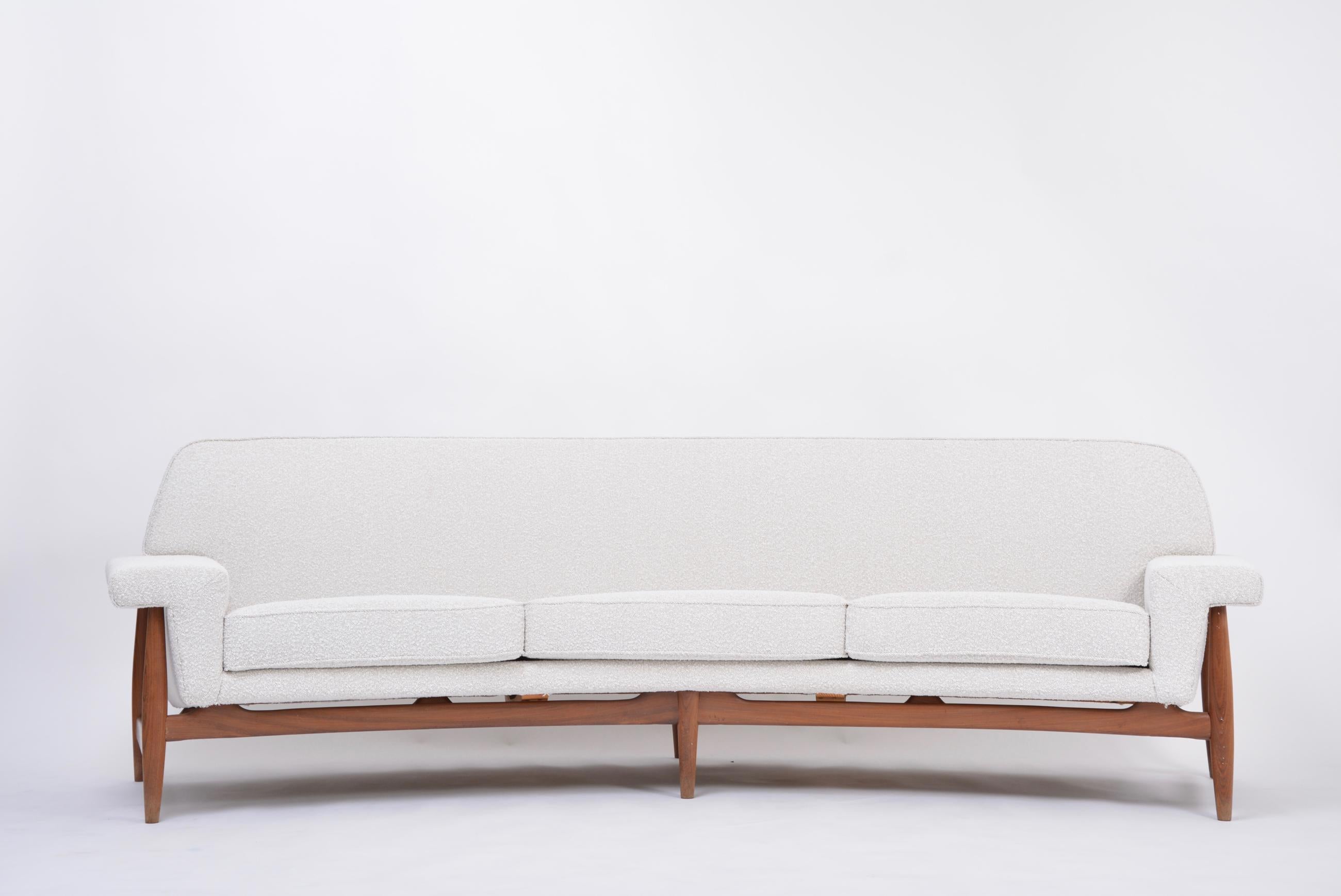 Large white reupholstered Mid-century sofa by Johannes Andersen for Trensum
This Mid-Century Modern sofa was designed by famous Danish designer Johannes Andersen in 1958 and manufactured at Trensum Møbelfabrik in Sweden. A wonderful example of