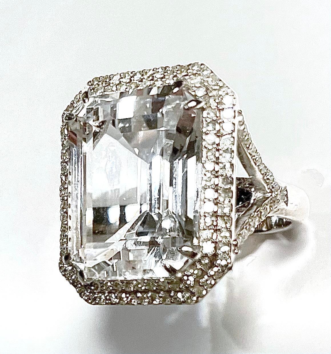 Description
Impressive large emerald cut White Topaz and pave diamond 14k white gold ring
Item # R155

Materials and Weight
White topaz, 14 x 18 mm, emerald cut 17 carats
Diamonds 0.90cts
14k white gold

Dimensions
Size 7

Made in Newport Beach,