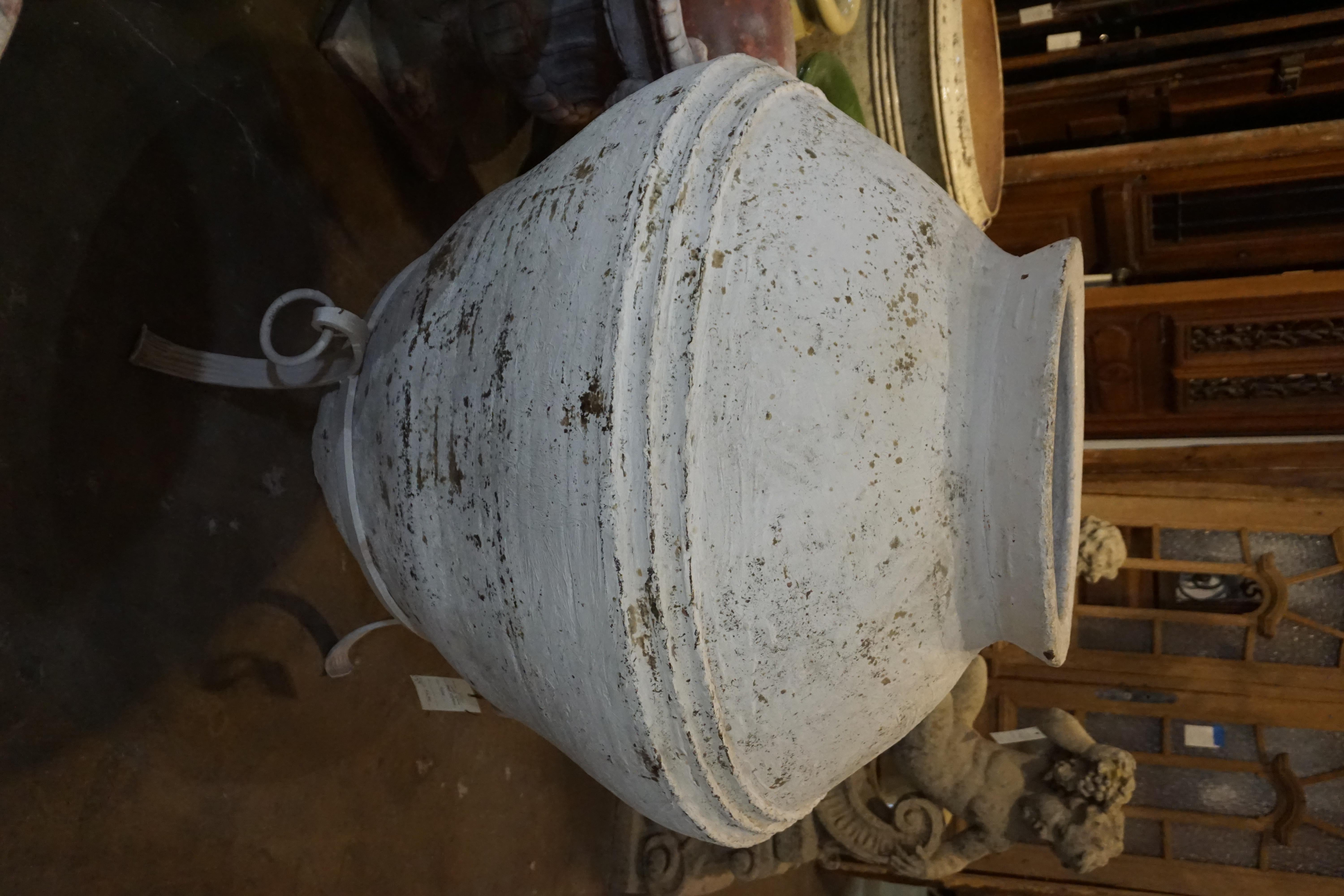 Large white vessel with stand

Measurements: 40.75