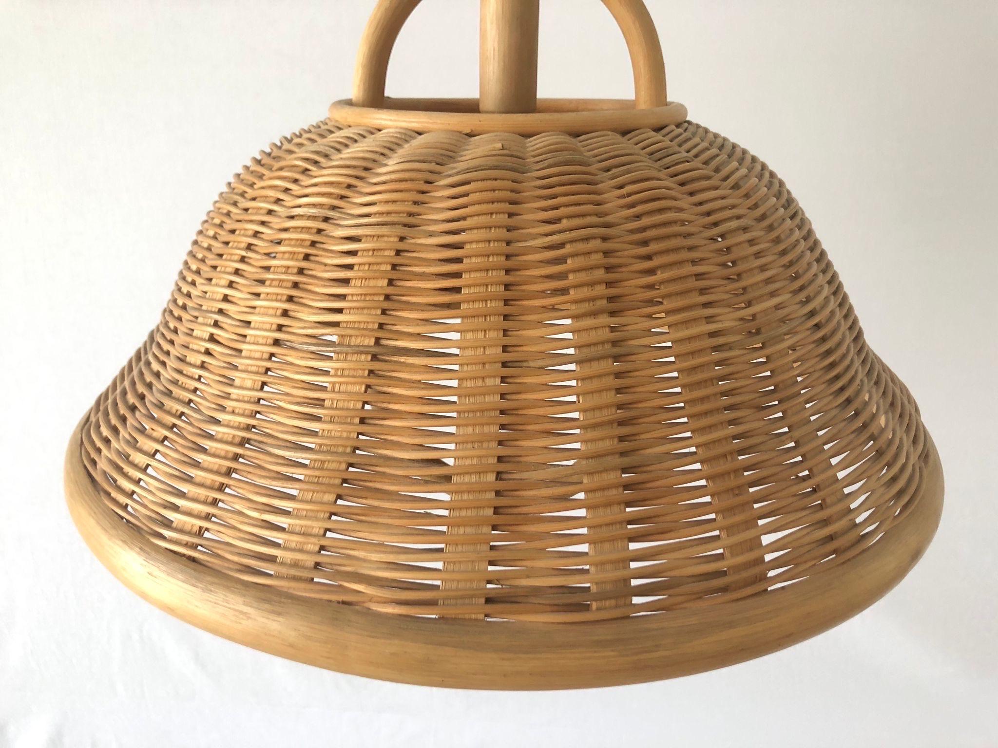 Large Wicker Adjustable Shade Pendant Lamp, 1960s, Germany

Lampshade is in very good vintage condition.
No crack, no missed piece.
Original canopy.

This lamp works with E27 light bulb. Max 100W
Wired and suitable to use with 220V and 110V for all