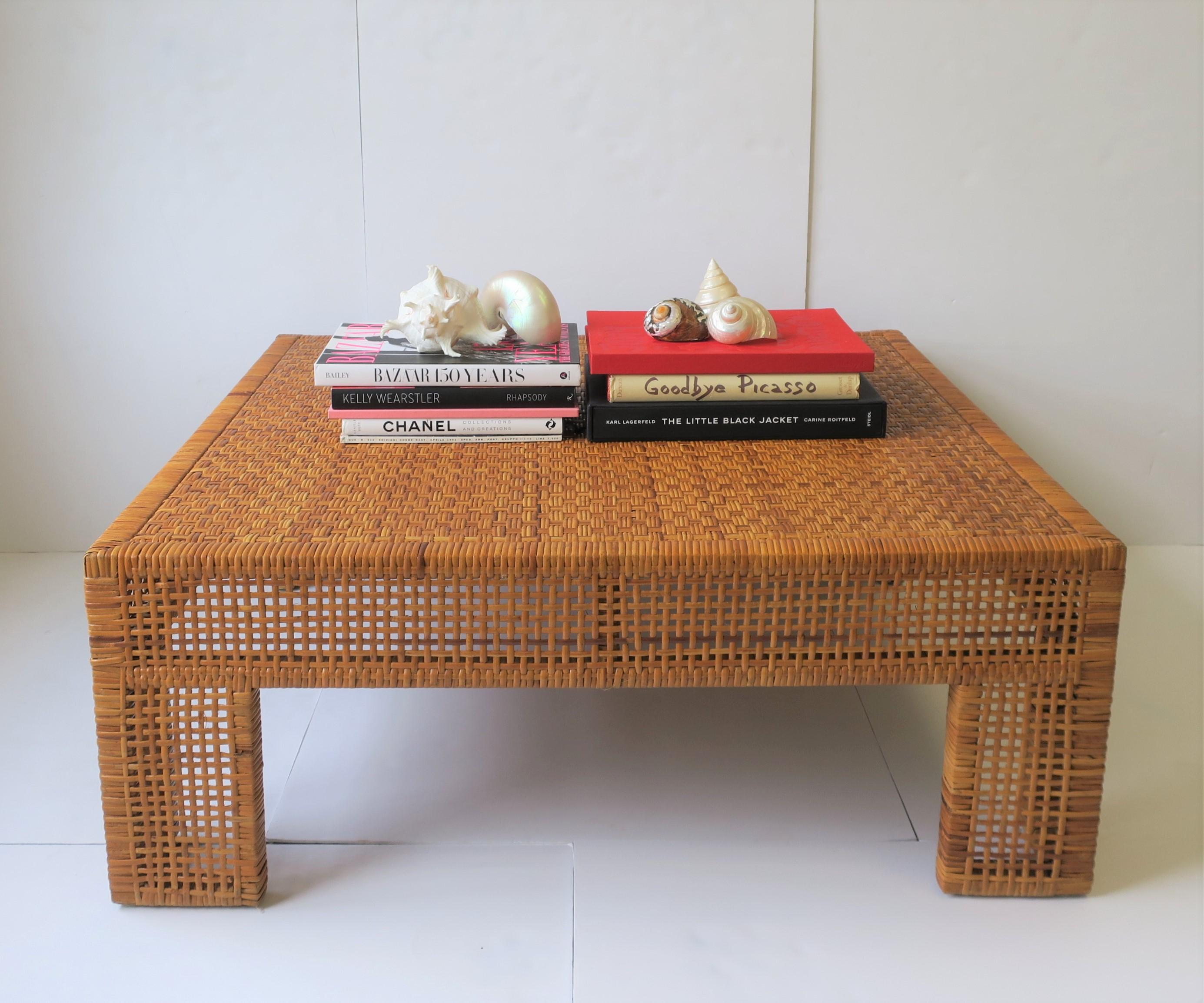 A very beautiful large wicker rattan coffee or cocktail table, circa late 20th century, 1980s - 1990s. Tabletop is reinforced underneath as show in image #15. 

Table measures: 41.75