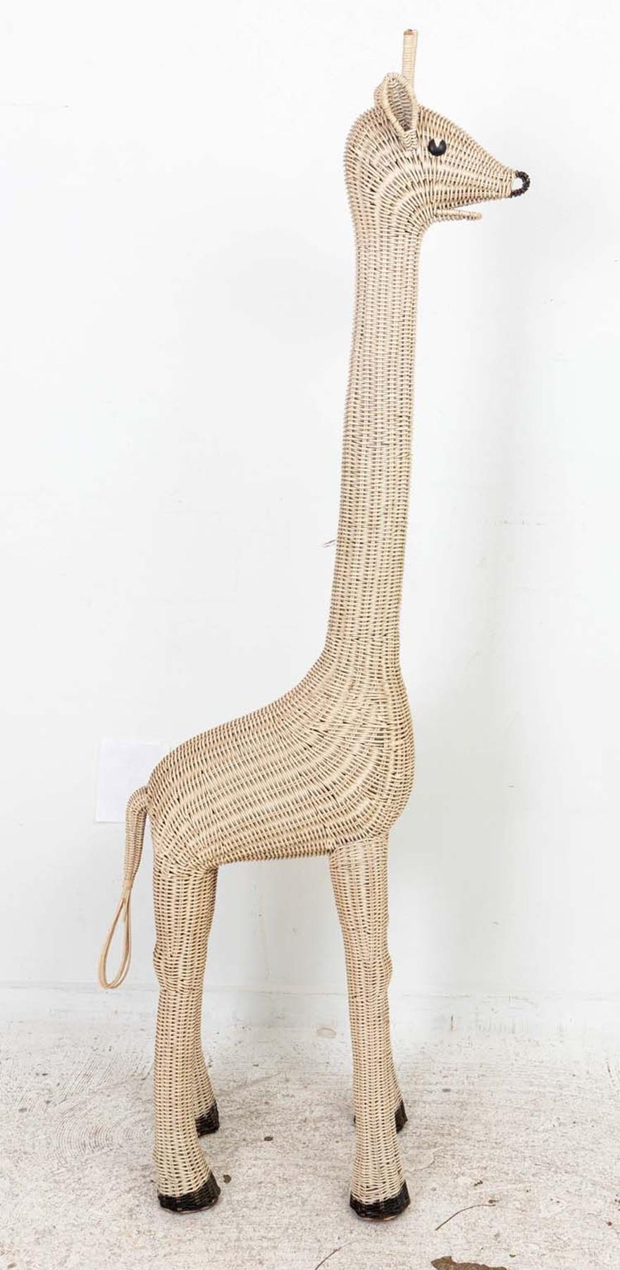 Large size wicker or rattan Giraffe. Late 20th century. Very good condition, ready to display. Whimsical design, perfect for the nursery. This was displayed in a toy store in New York from the late 20th century until they closed around 2020.
