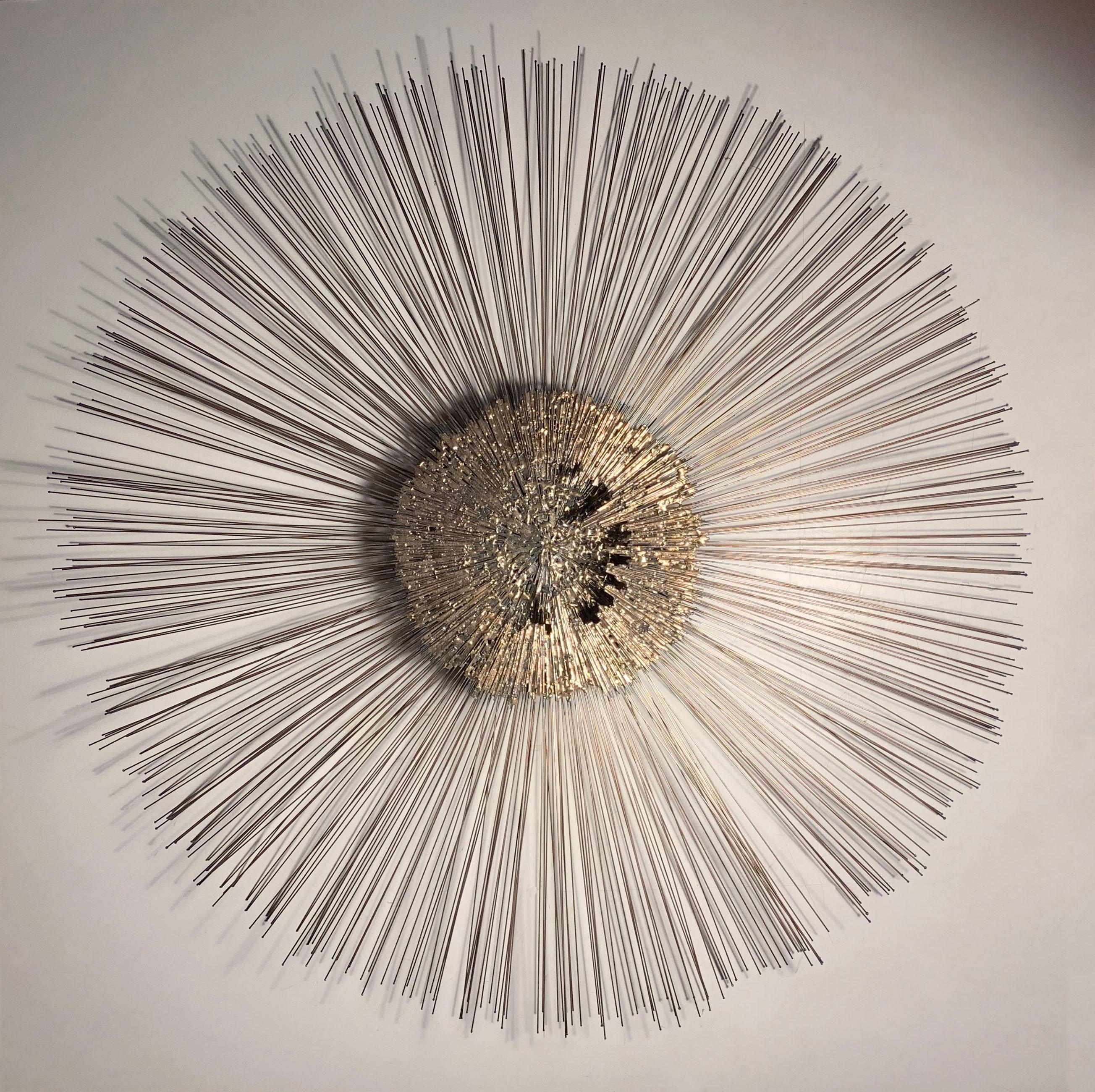 A large attractive Sunburst Wall Sculpture attributed to William and Bruce Friedle

In the manner of Curtis Jere